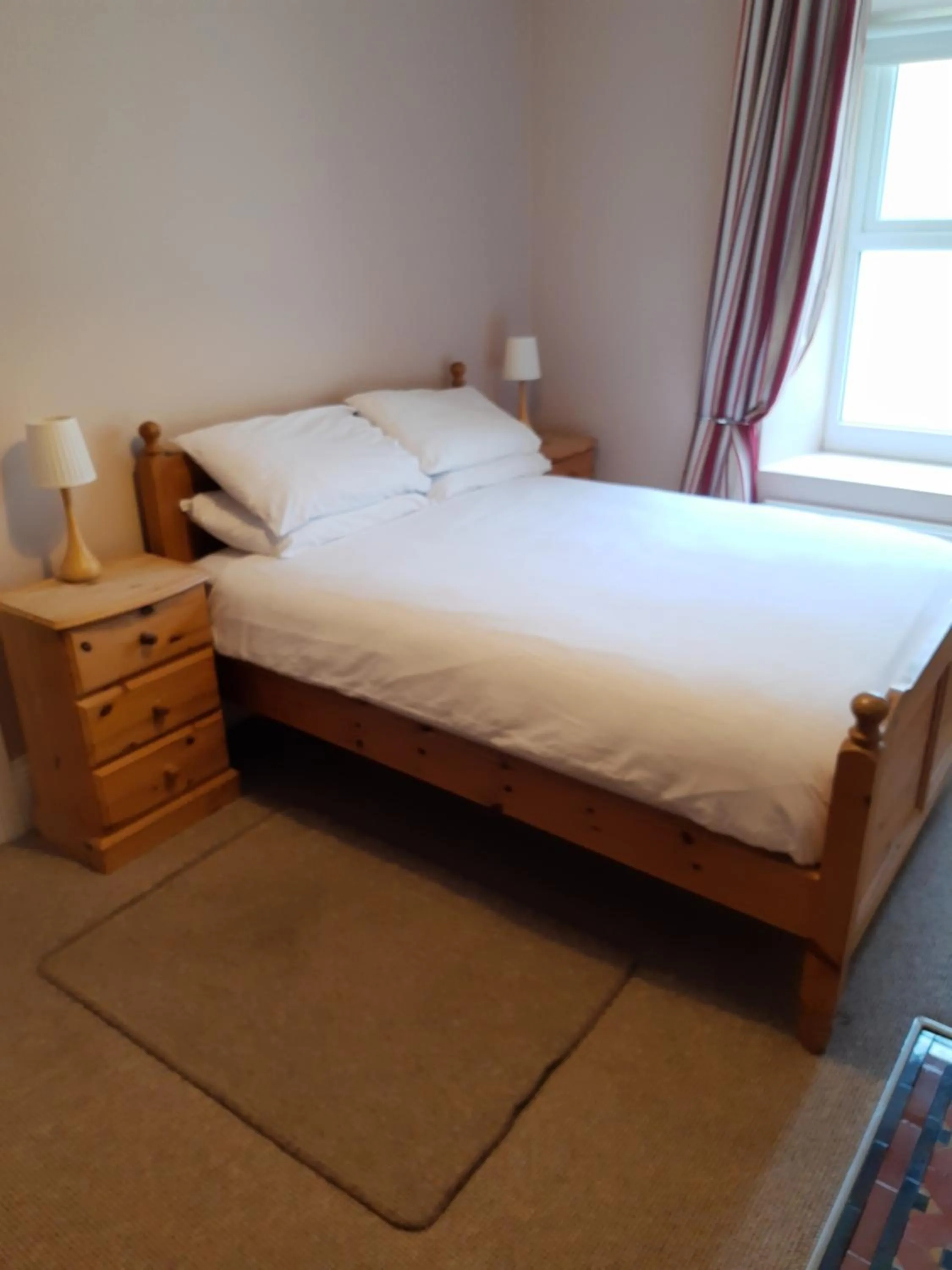 Bed in Snooze Apartments