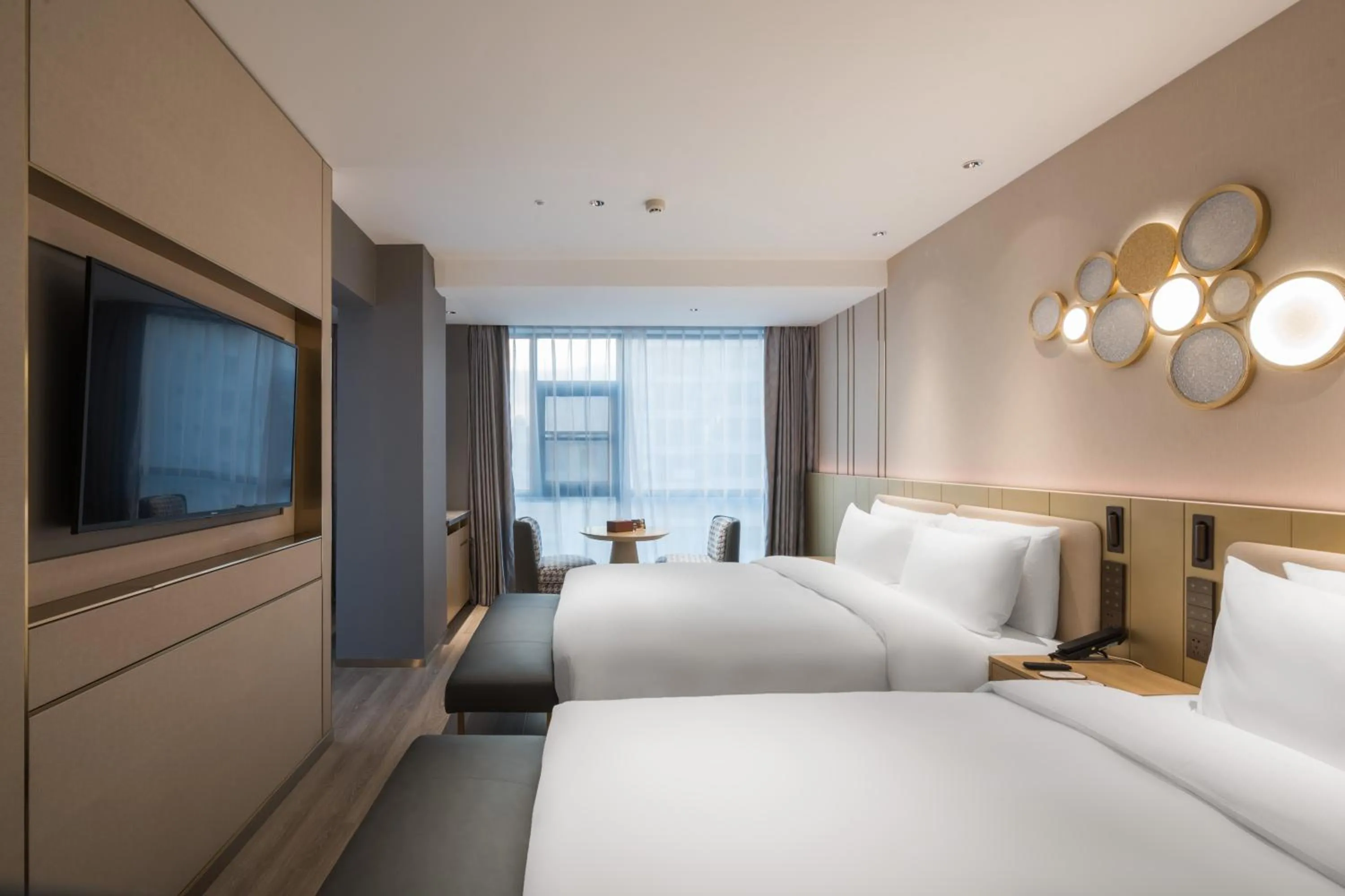 Bed in Orange Hotel Sanya Phoenix Airport