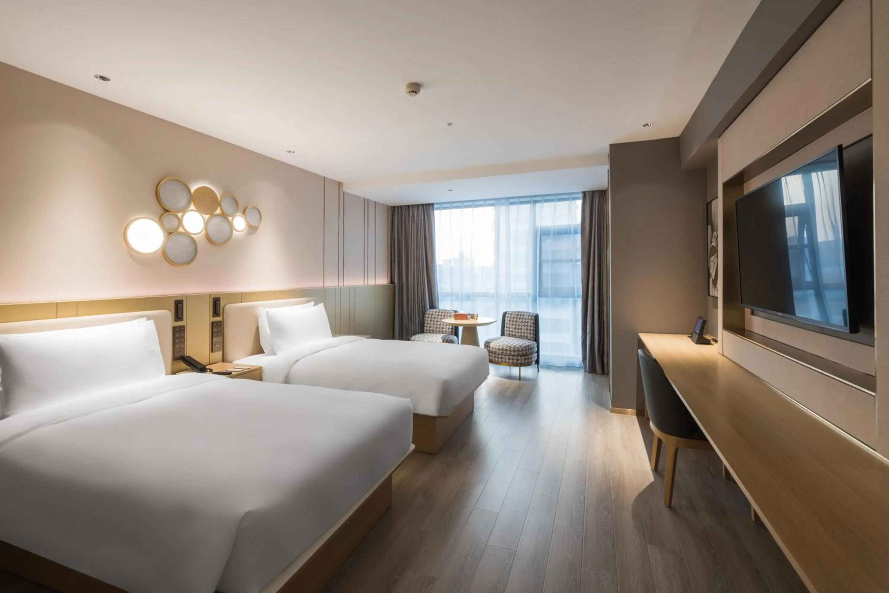 Photo of the whole room, Bed in Orange Hotel Sanya Phoenix Airport