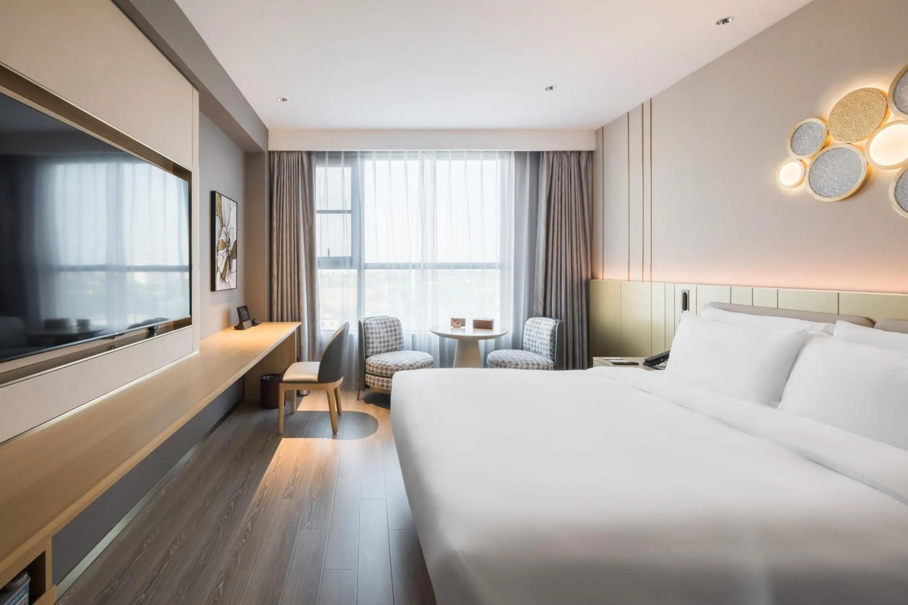 Bed in Orange Hotel Sanya Phoenix Airport