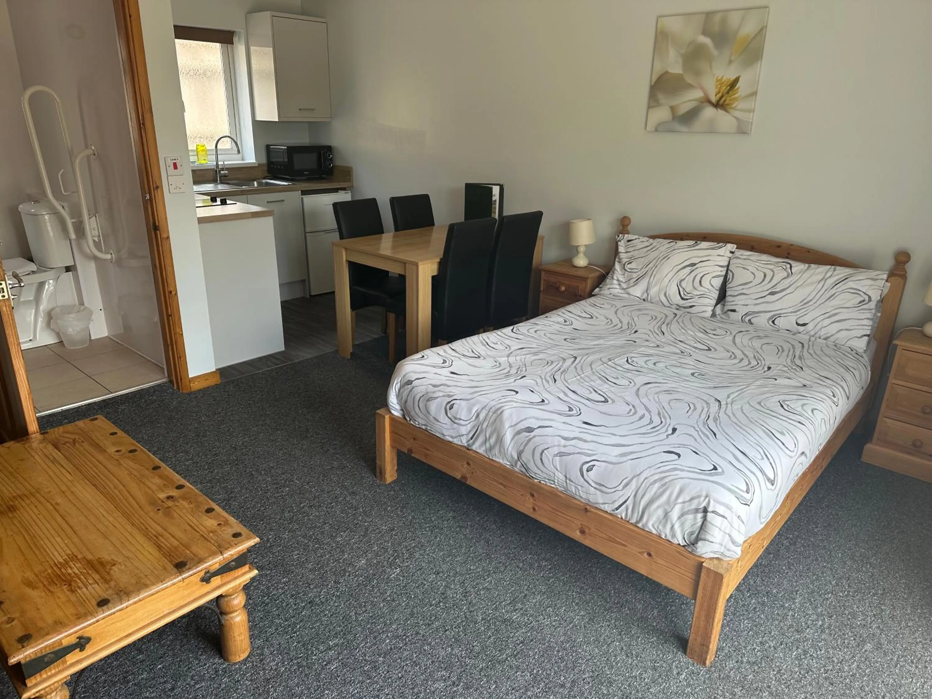 Bed in Forest Edge Motel