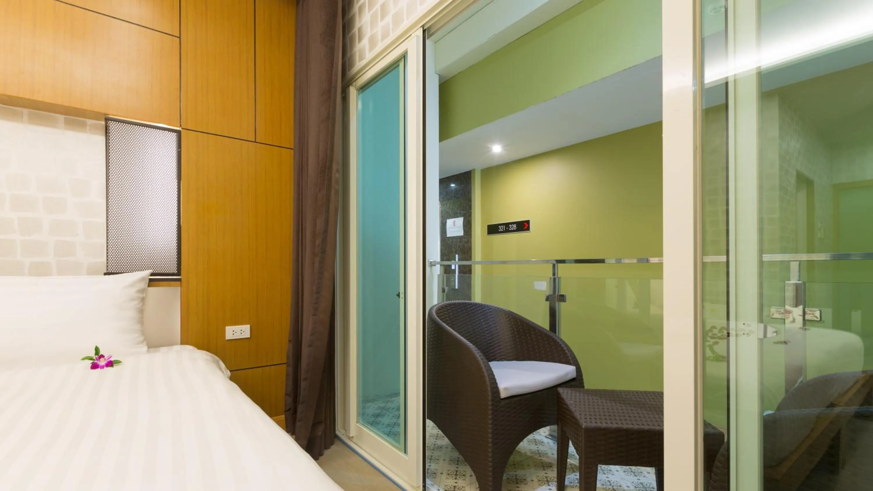 Balcony/Terrace, Bed in Anda Beachside Hotel