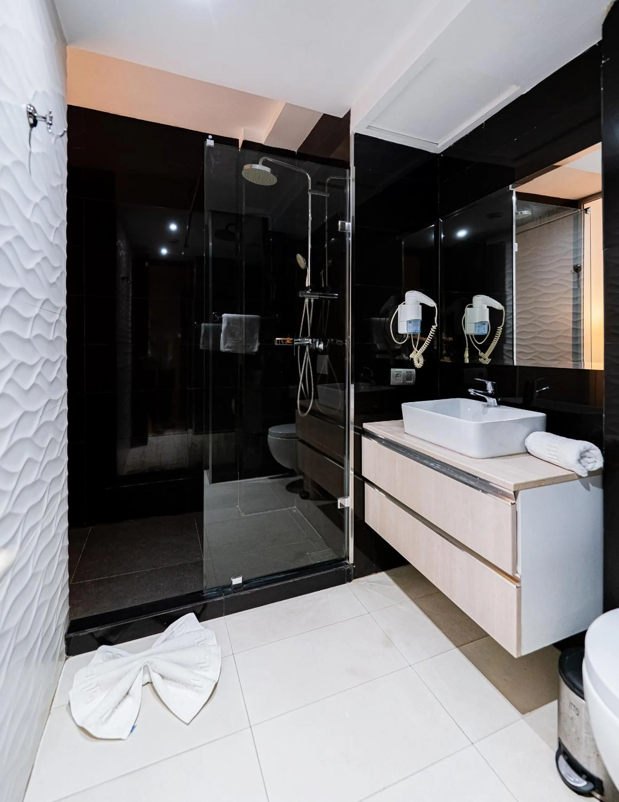 Bed in The Fourteen Luxury Boutique Hotel