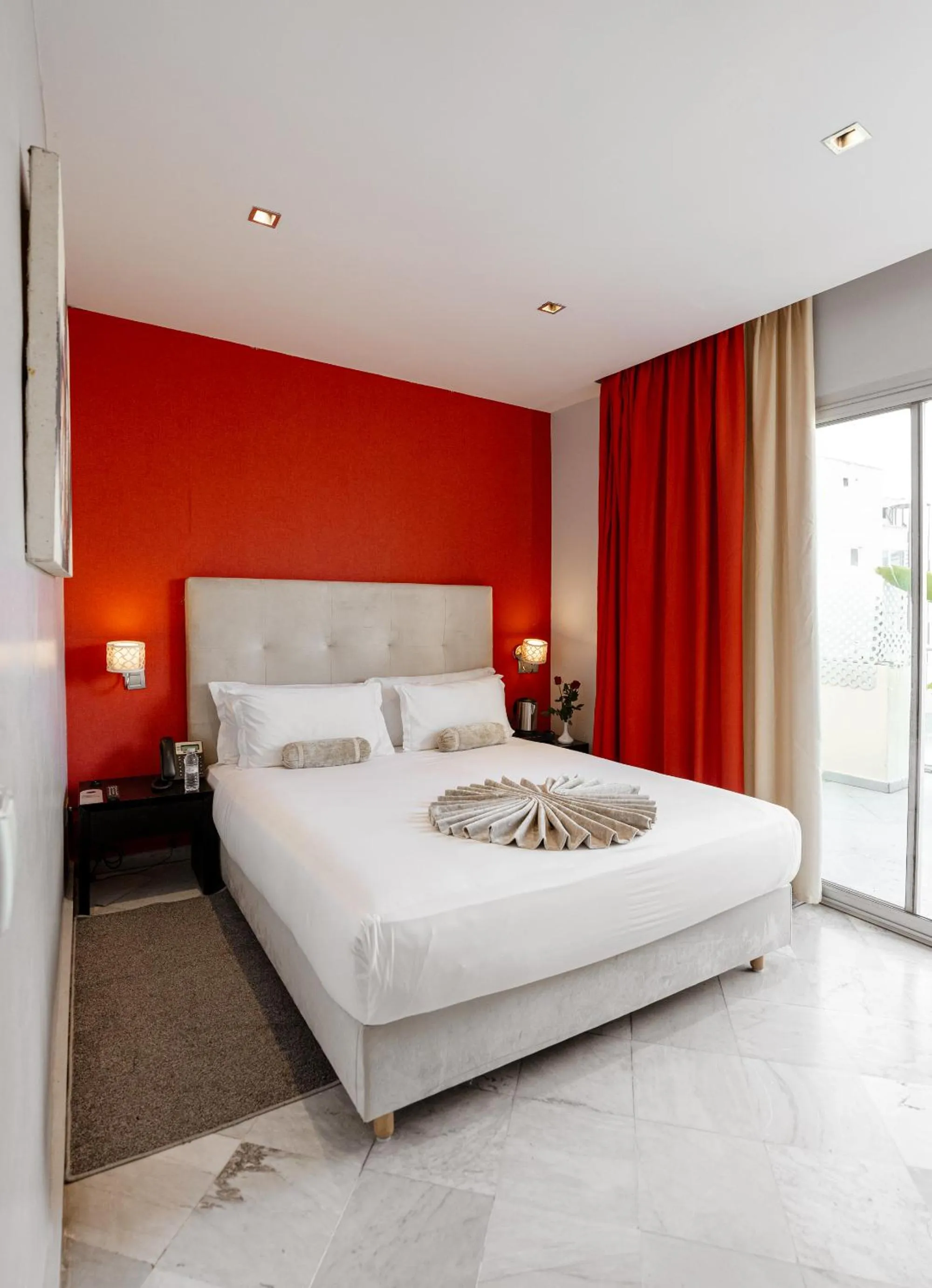 Bed in The Fourteen Luxury Boutique Hotel