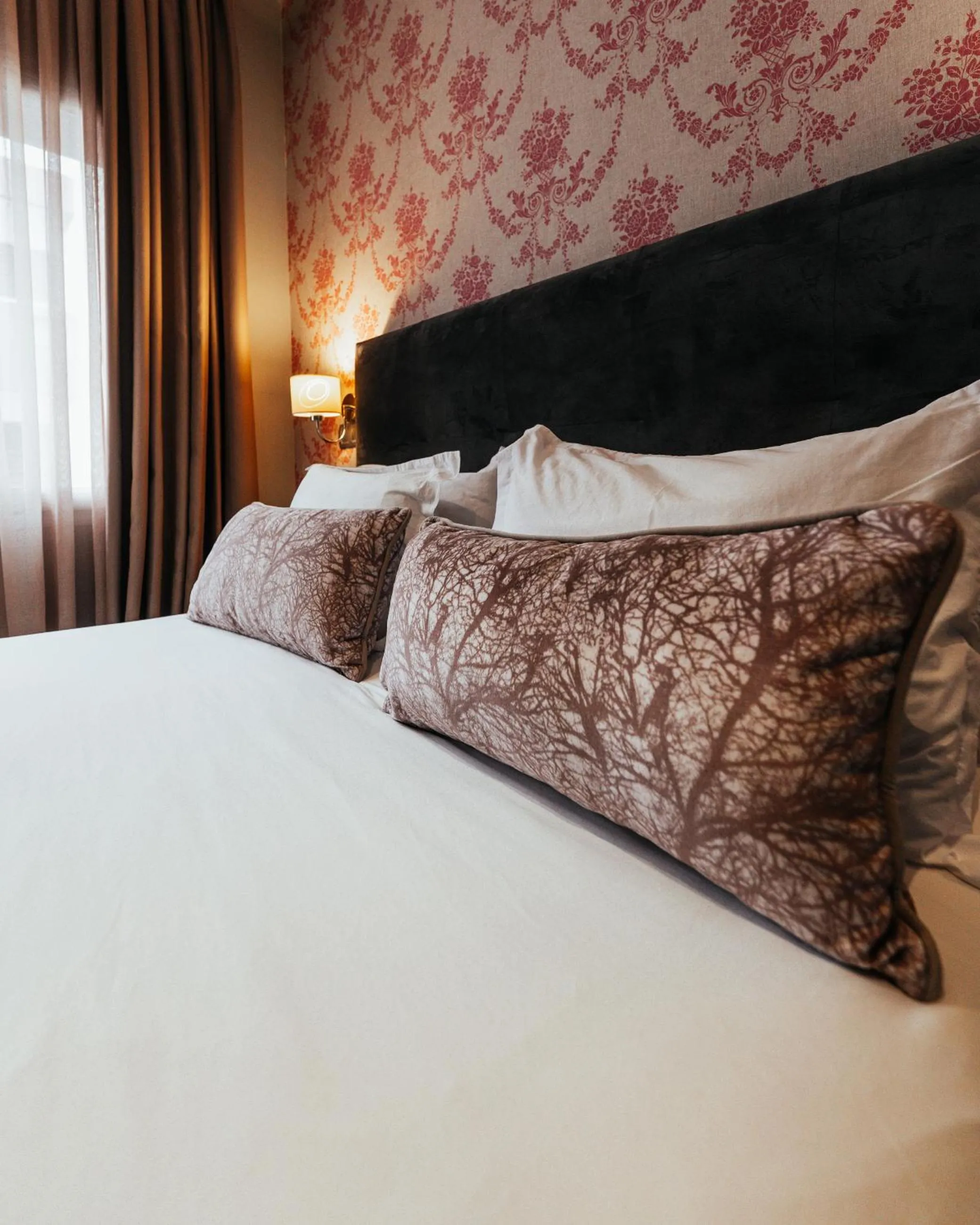 Bed in The Fourteen Luxury Boutique Hotel