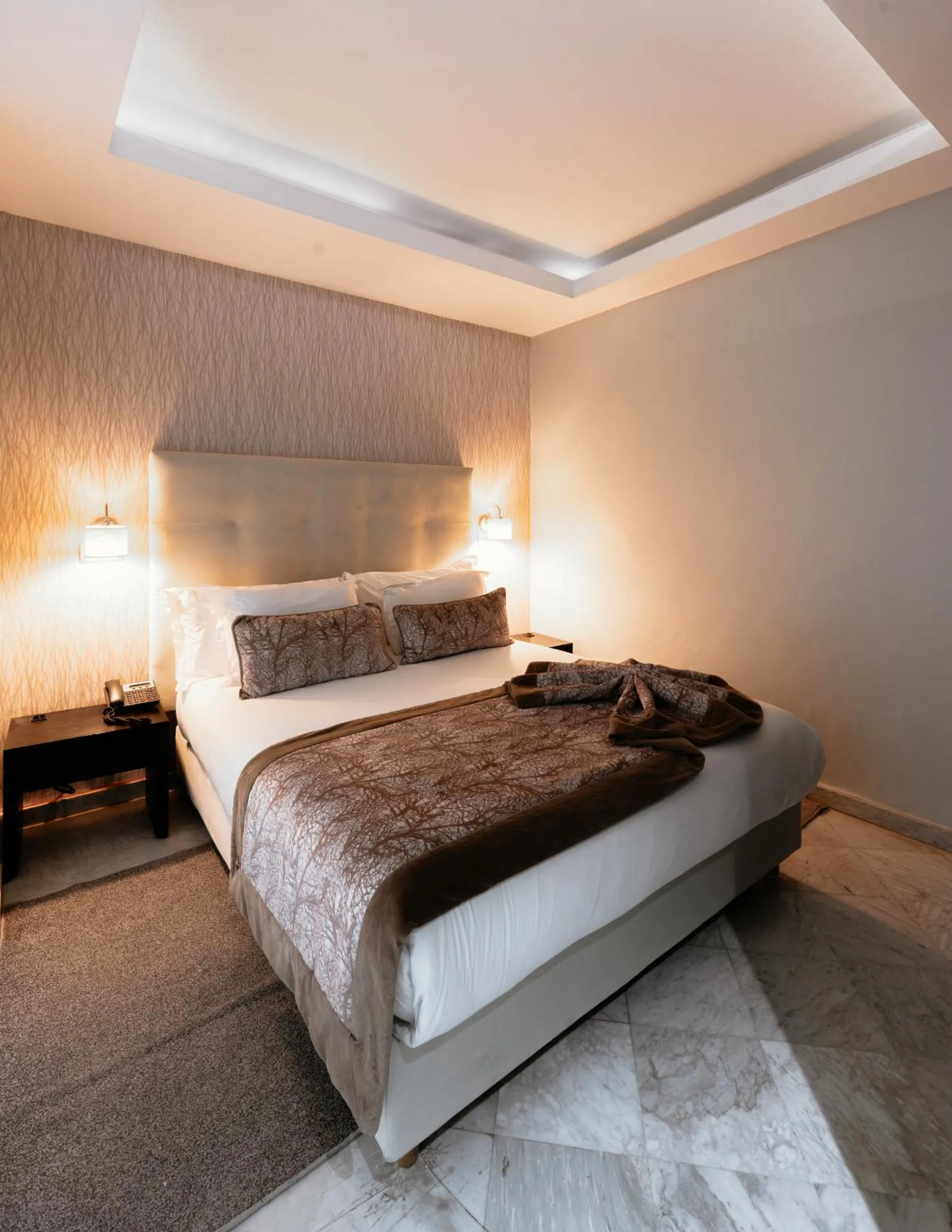 Bed in The Fourteen Luxury Boutique Hotel