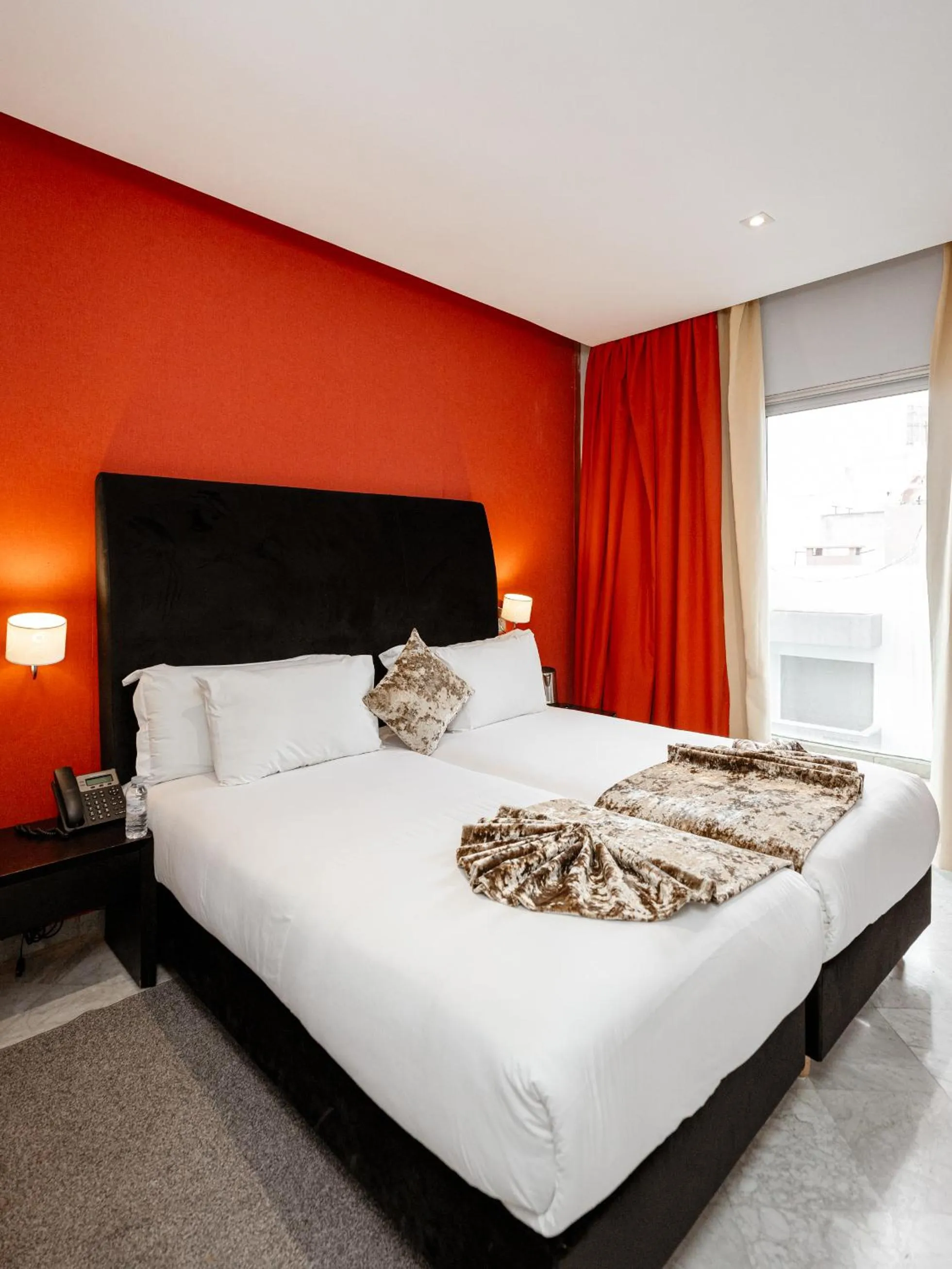 Bed in The Fourteen Luxury Boutique Hotel