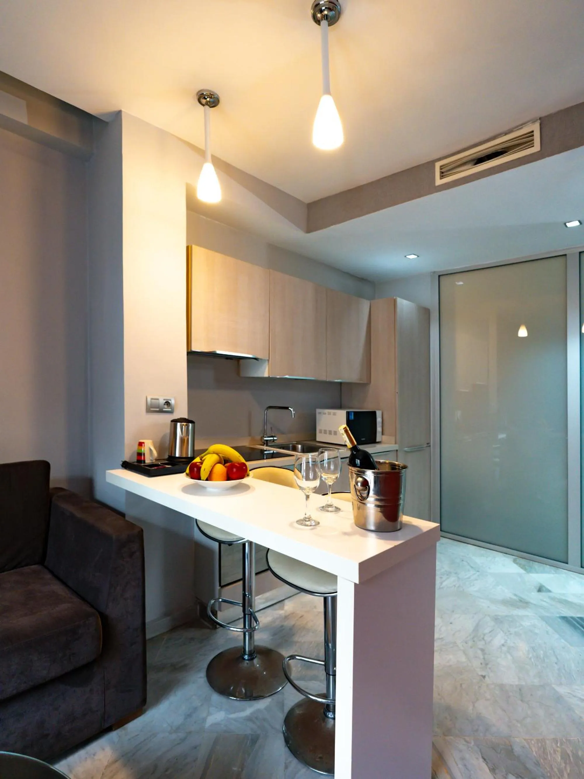 Kitchen or kitchenette in The Fourteen Luxury Boutique Hotel