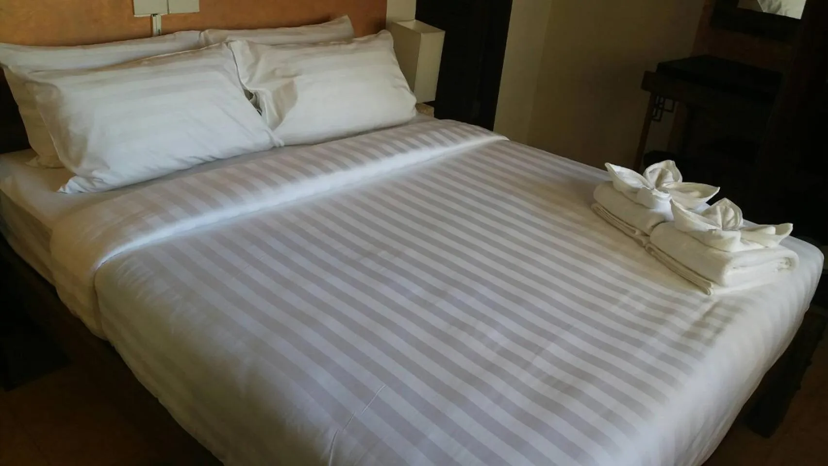 Bed in Arcadia Maephim Serviced Apartments