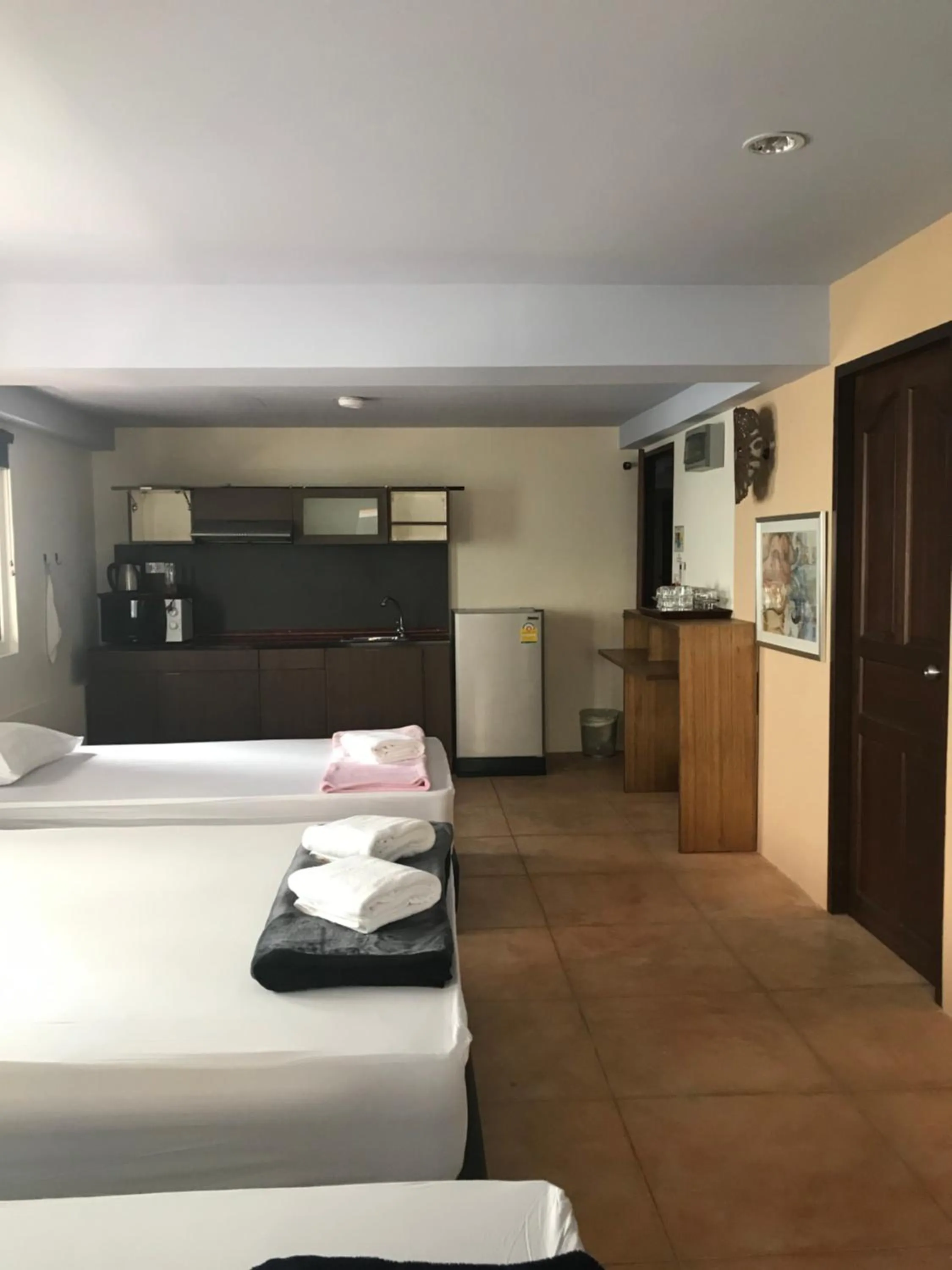 Bed in Arcadia Maephim Serviced Apartments
