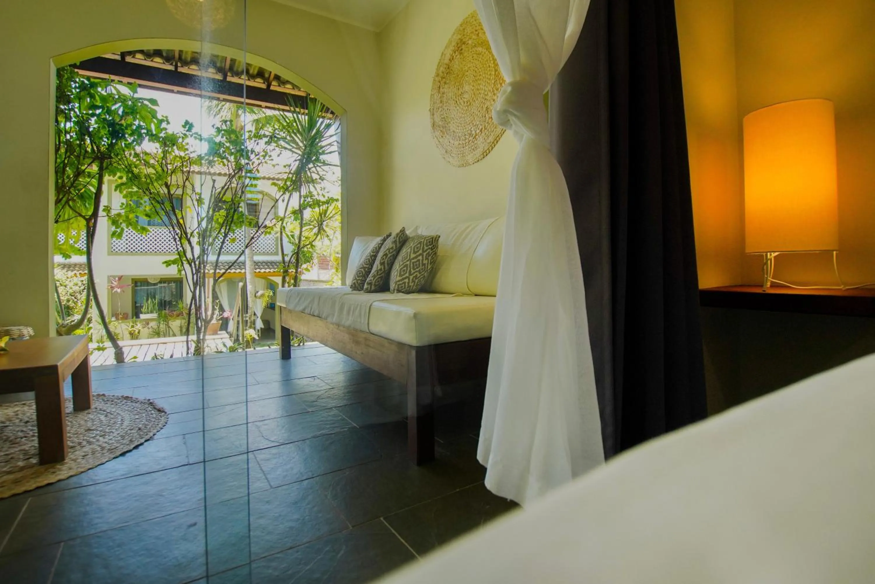 Seating area, Bed in Flor da Mata