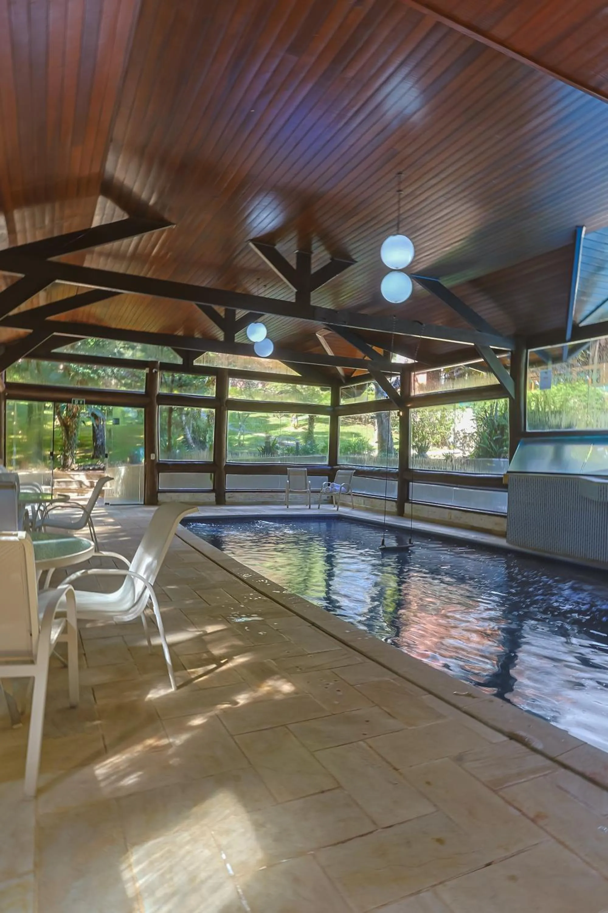 Swimming pool in Pousada & Spa Cantos e Contos