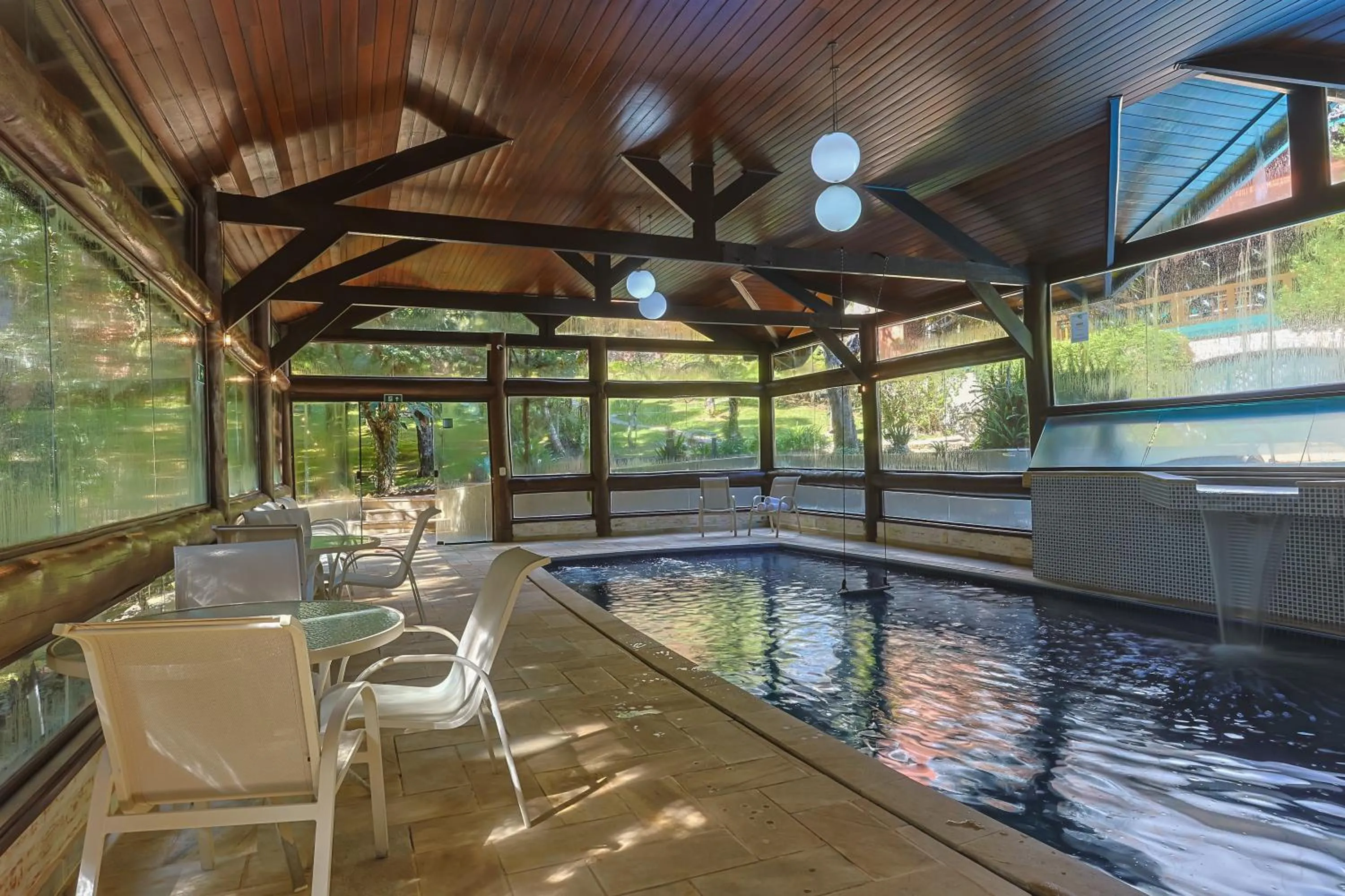 Swimming pool in Pousada & Spa Cantos e Contos