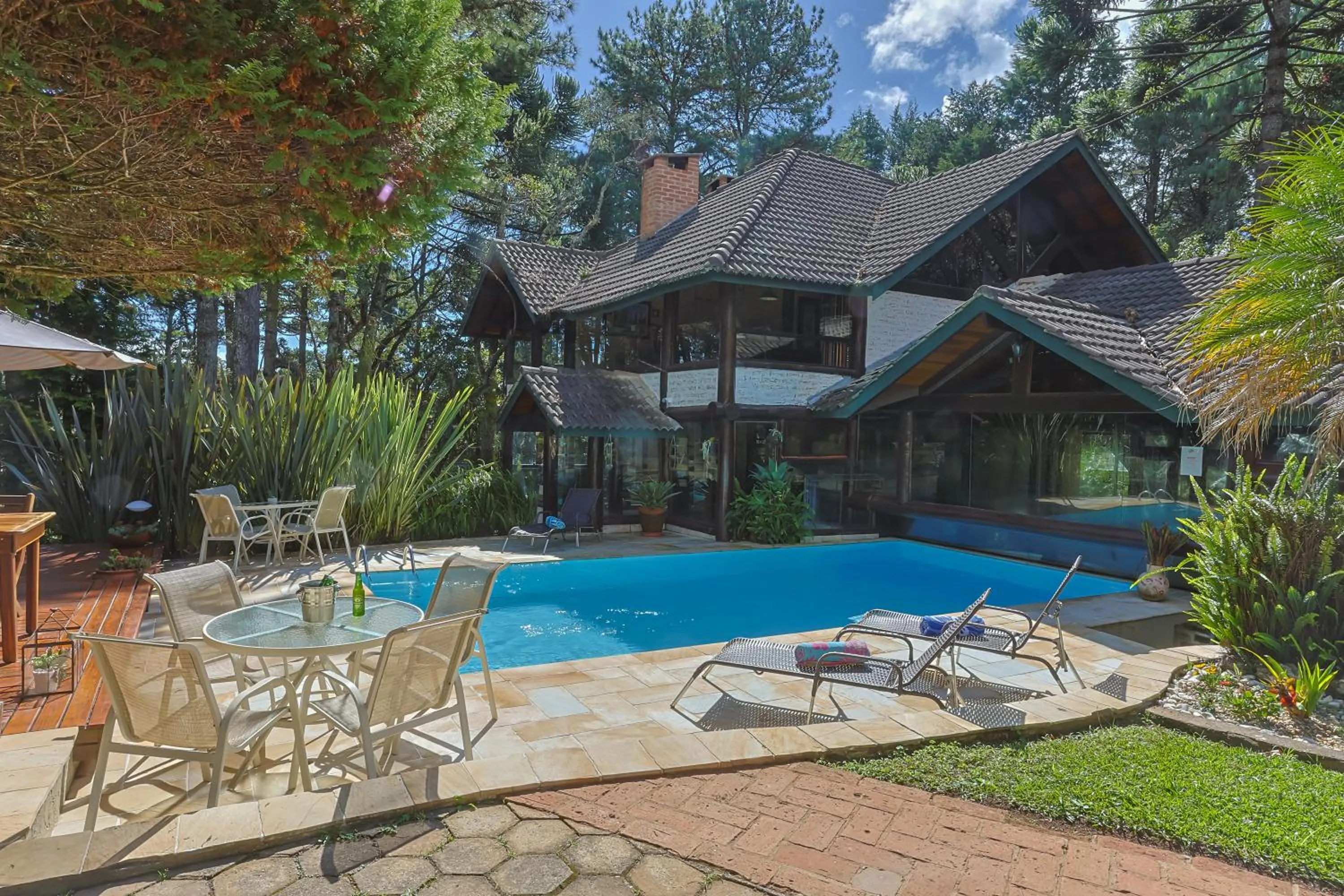 Swimming pool in Pousada & Spa Cantos e Contos