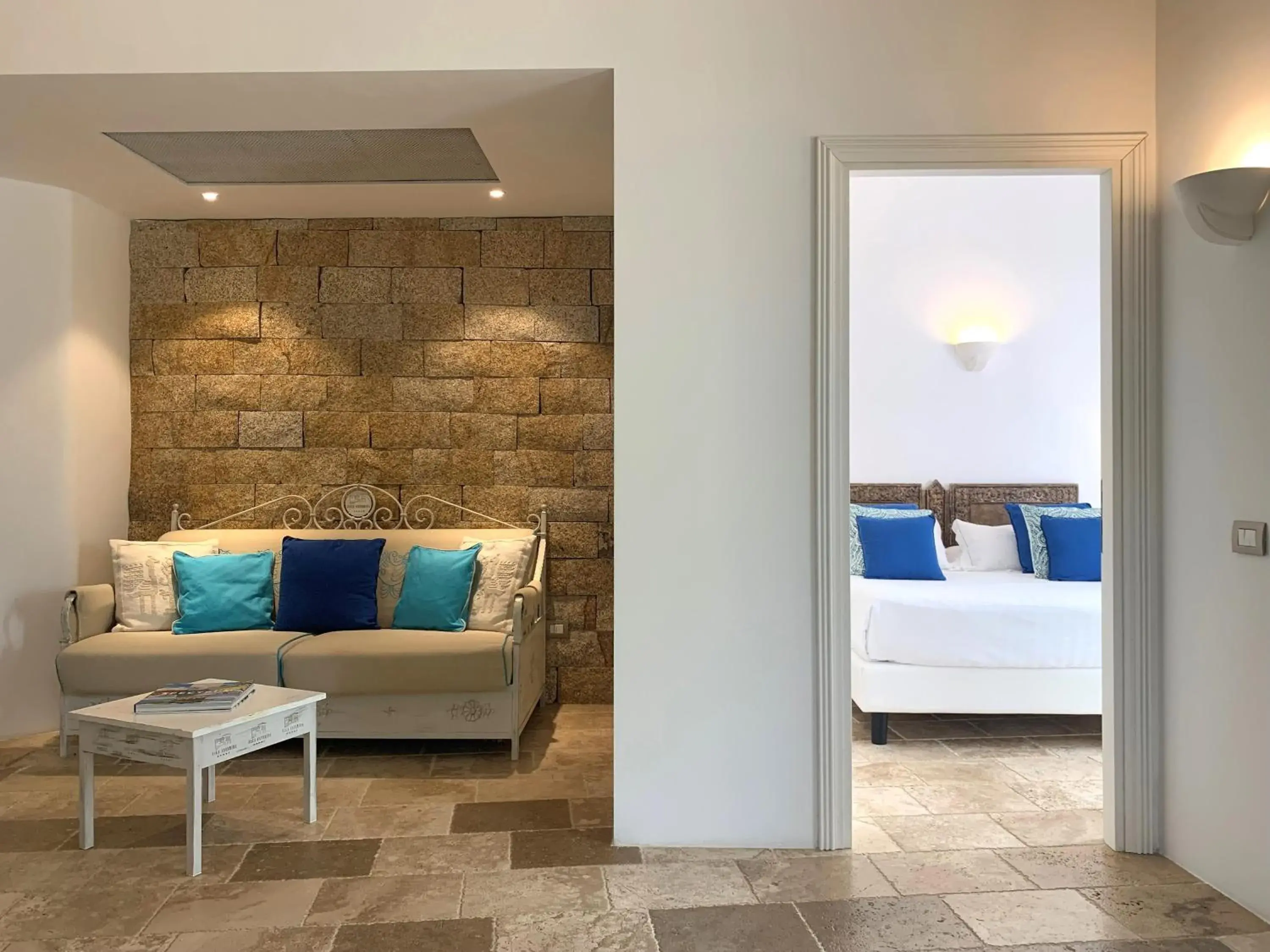 Living room, Bed in Hotel Cala Caterina Living room, Bed in Hotel Cala Caterina