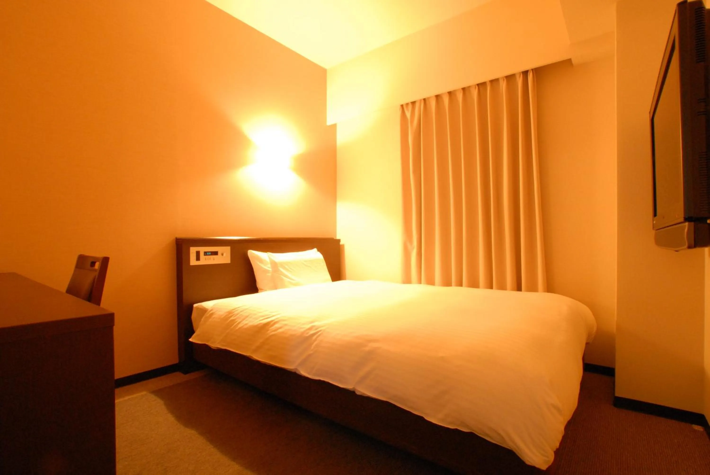 Bed in AB Hotel Toyota Motomachi