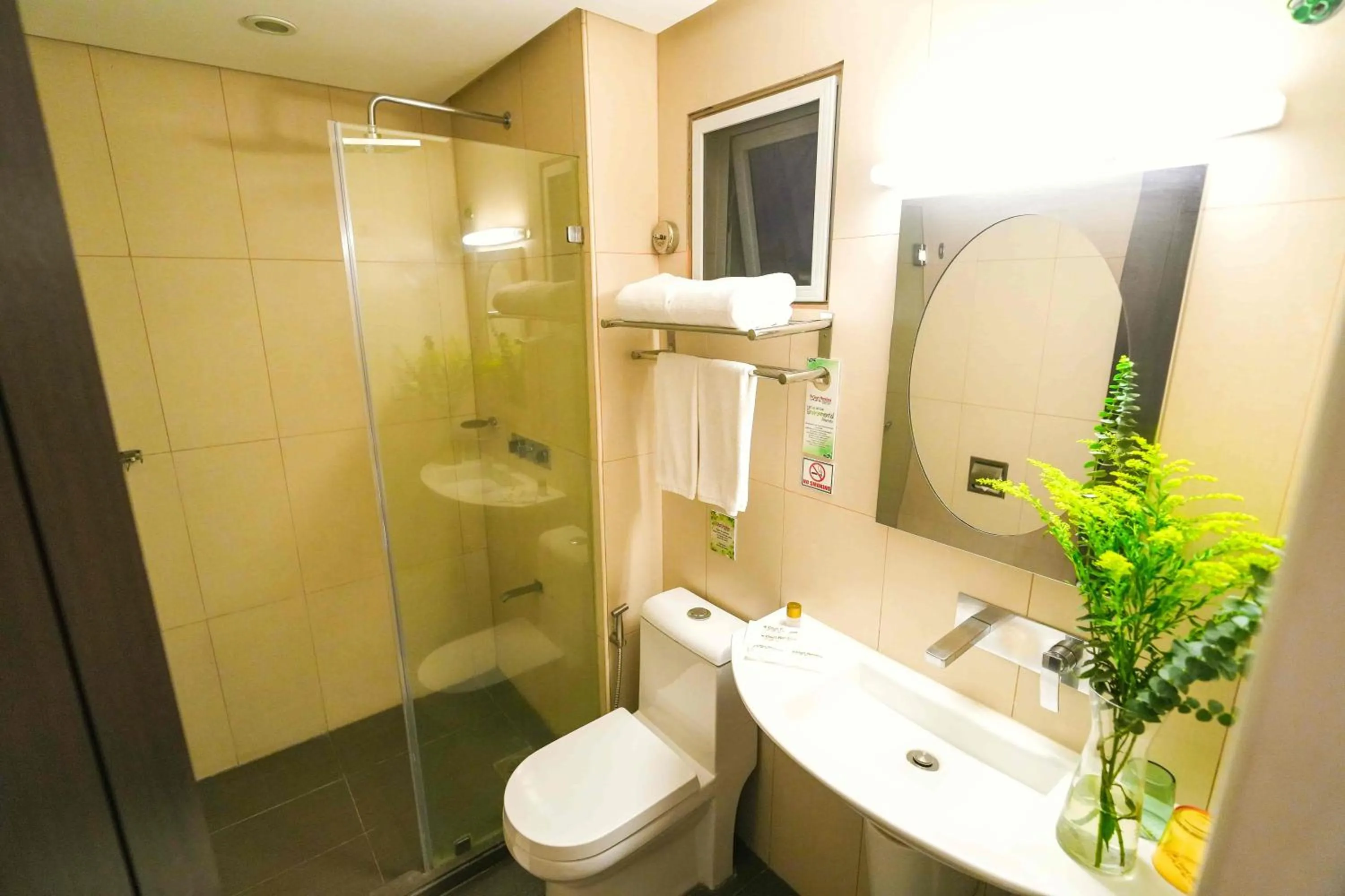 Bathroom in Court Meridian Hotel & Suites