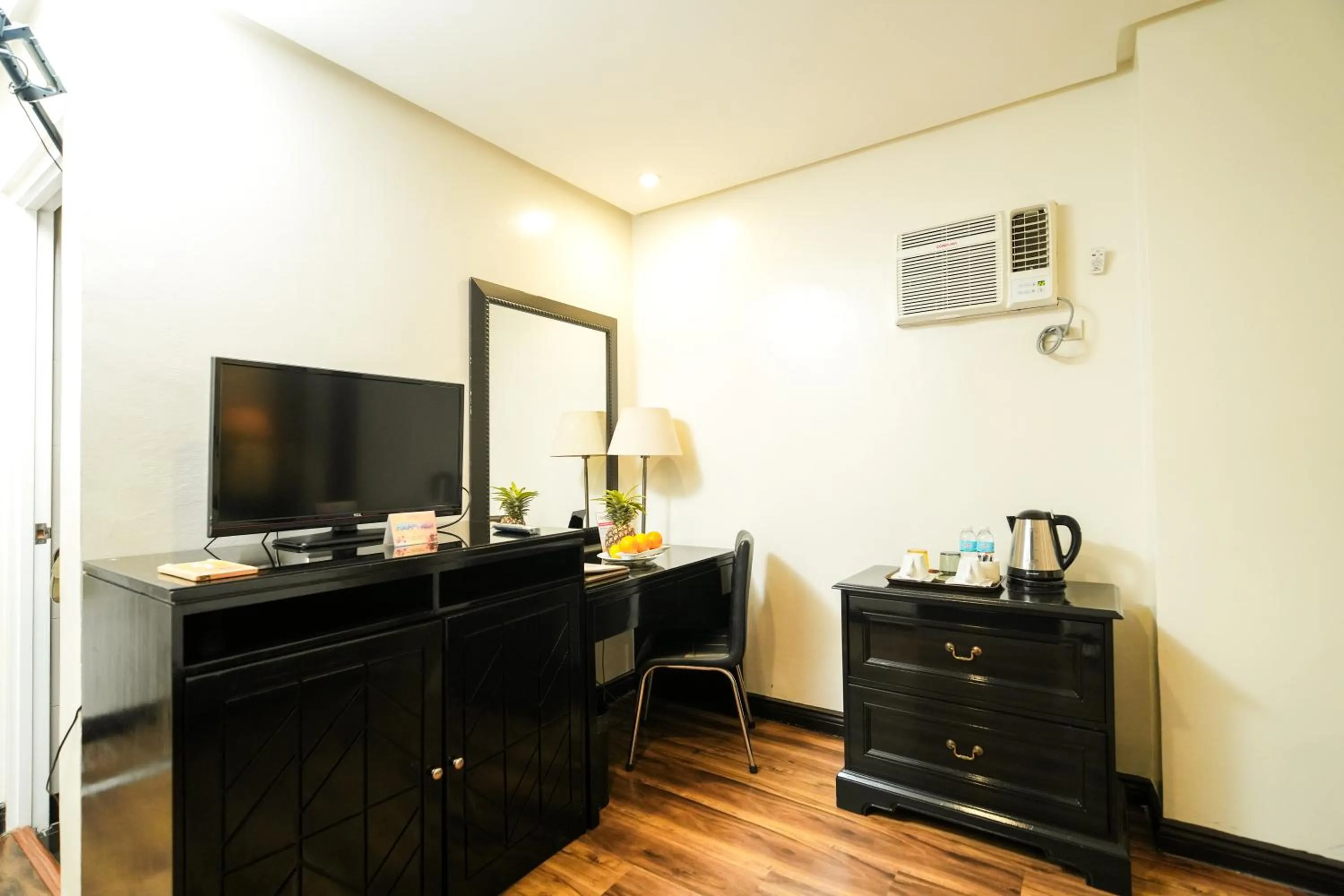 Bedroom in Court Meridian Hotel & Suites