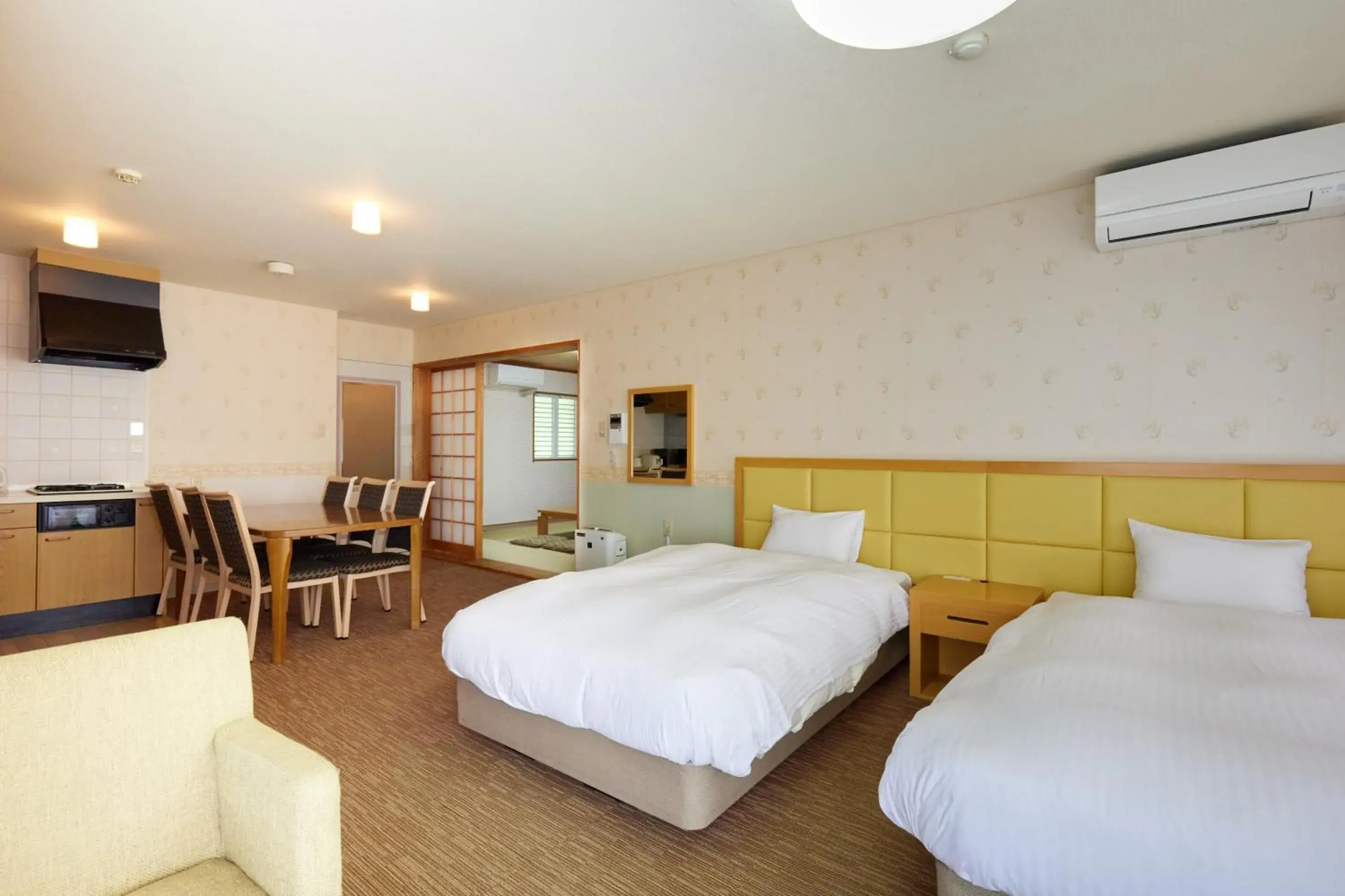 Bed in Reyzenit Kinosaki Suite VILLA Bed in Reyzenit Kinosaki Suite VILLA