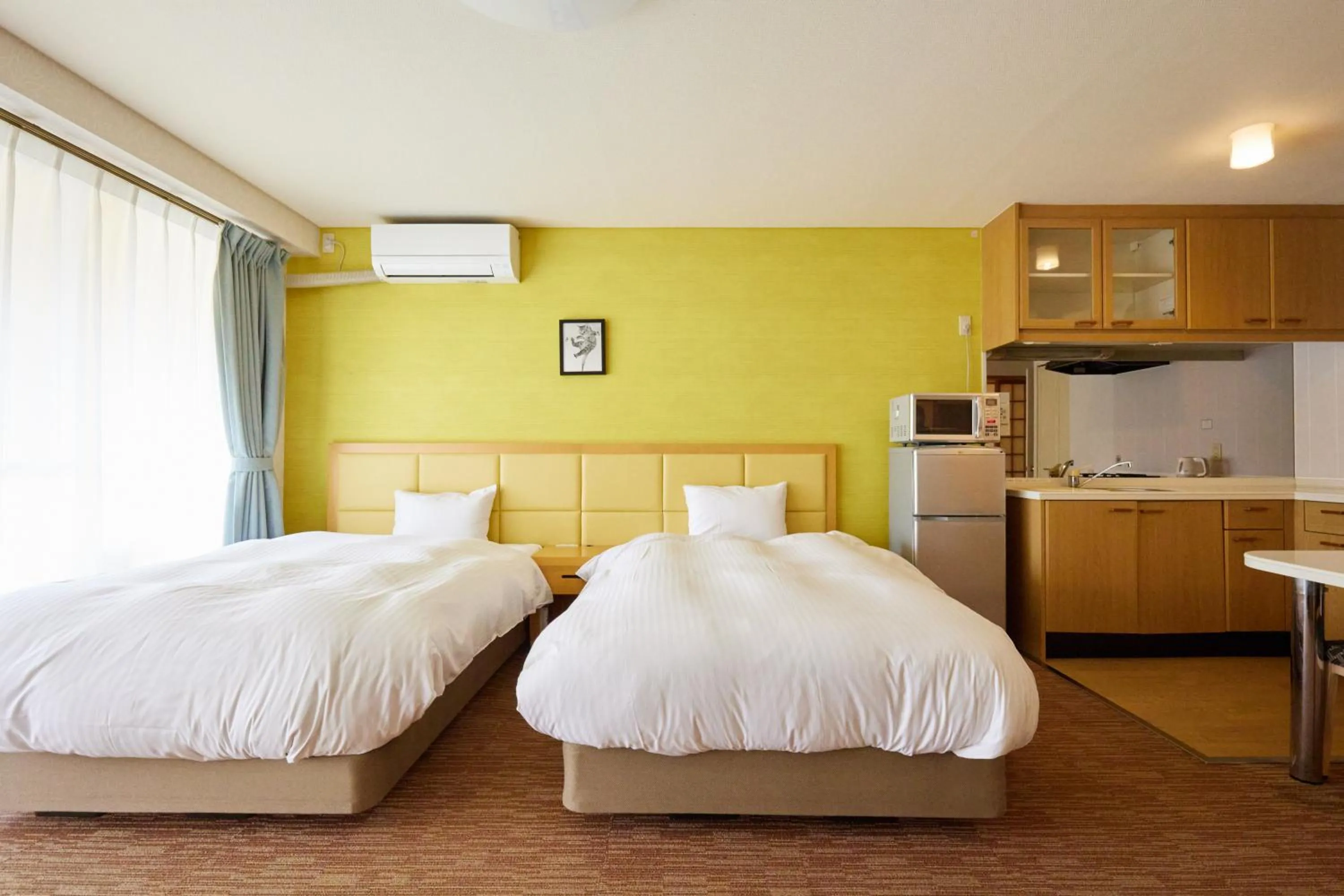 Bed in Reyzenit Kinosaki Suite VILLA