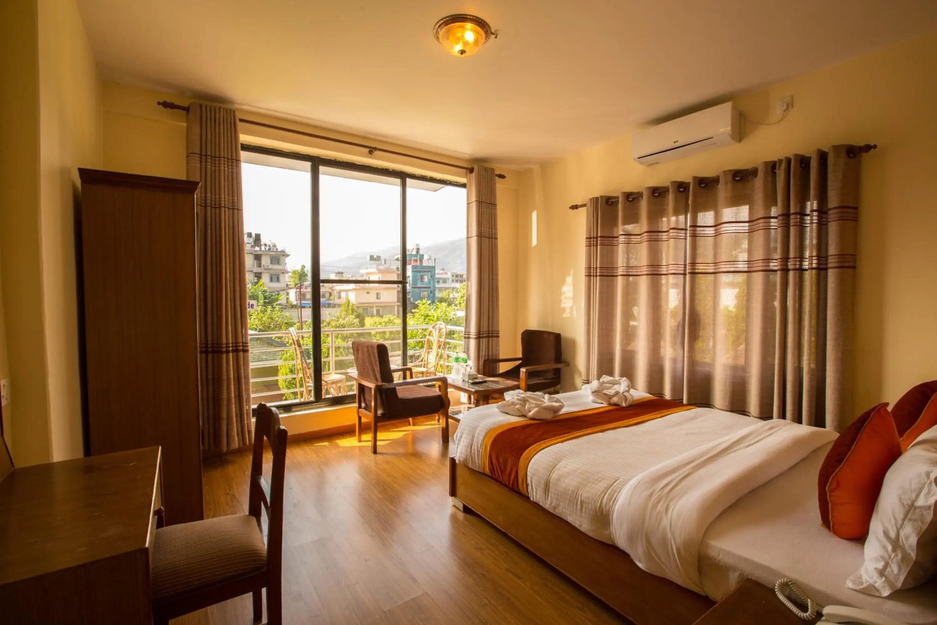 Deluxe Double Room with Balcony in Hotel Pokhara View Deluxe Double Room with Balcony in Hotel Pokhara View