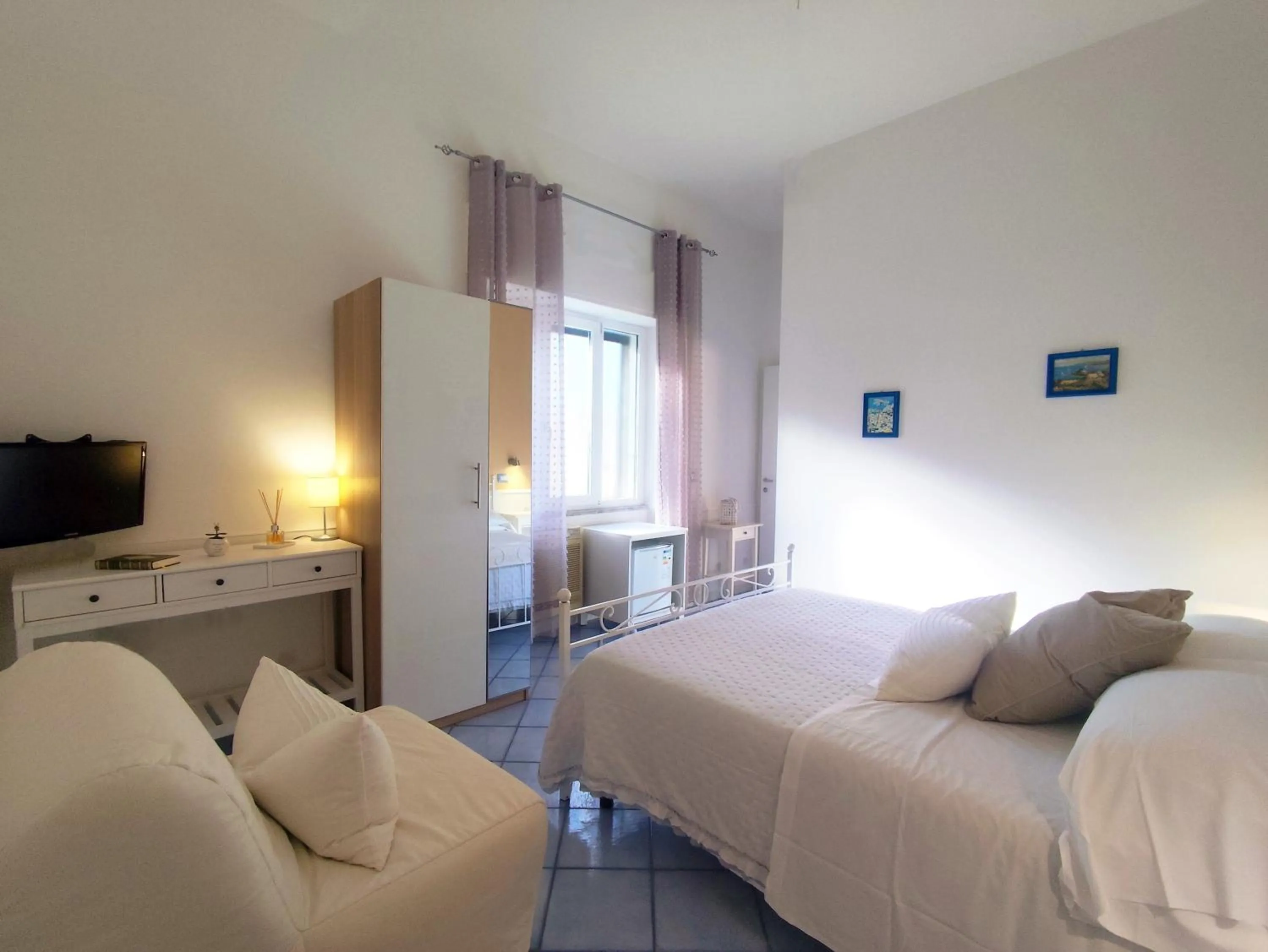 Bed in B&B Posidonia