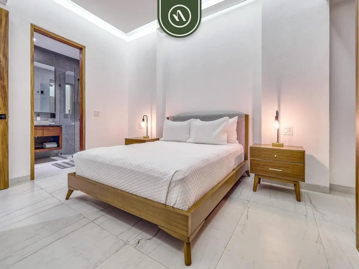 Bed in Amazing 1 BR Condo with Terrace - Rooftop Pool