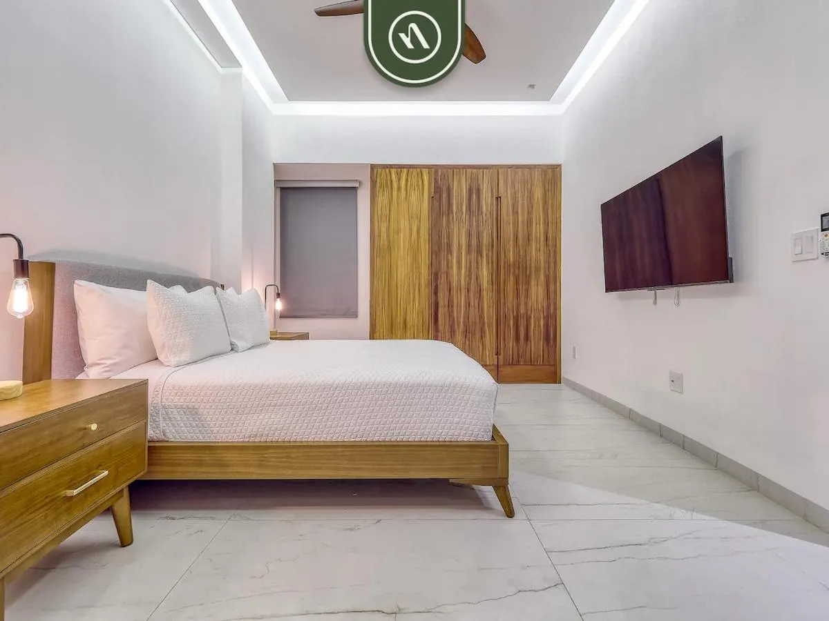 Bed in Amazing 1 BR Condo with Terrace - Rooftop Pool