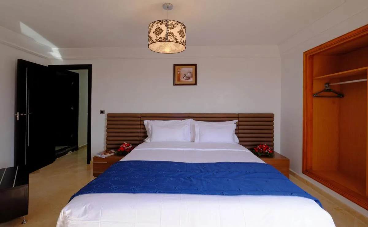 Bed in Appart Hôtel Mouna