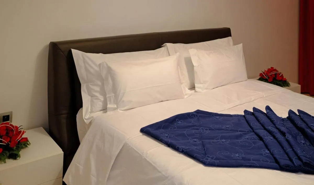 Bed in Appart Hôtel Mouna