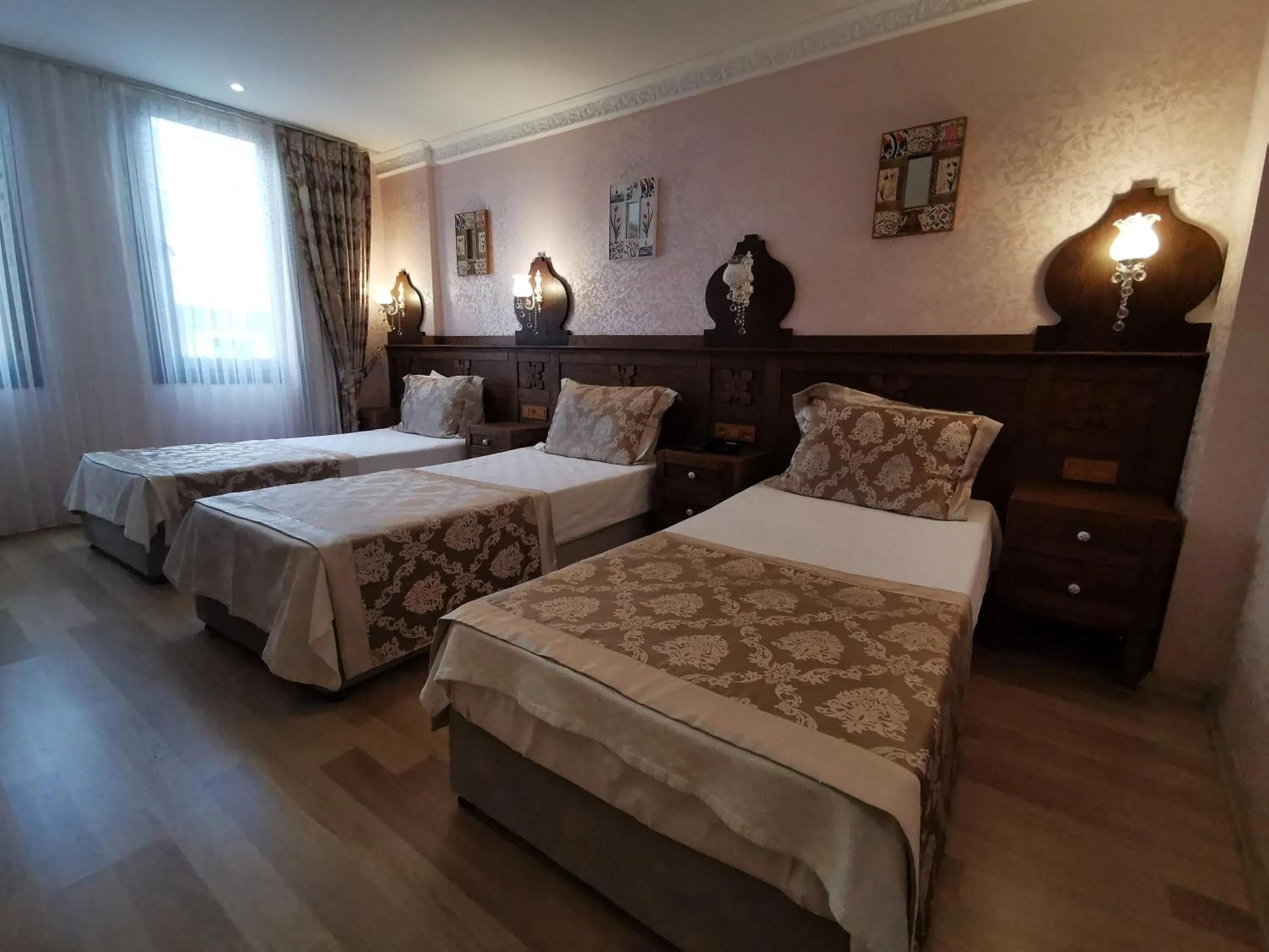 Bed in Perapolis Hotel