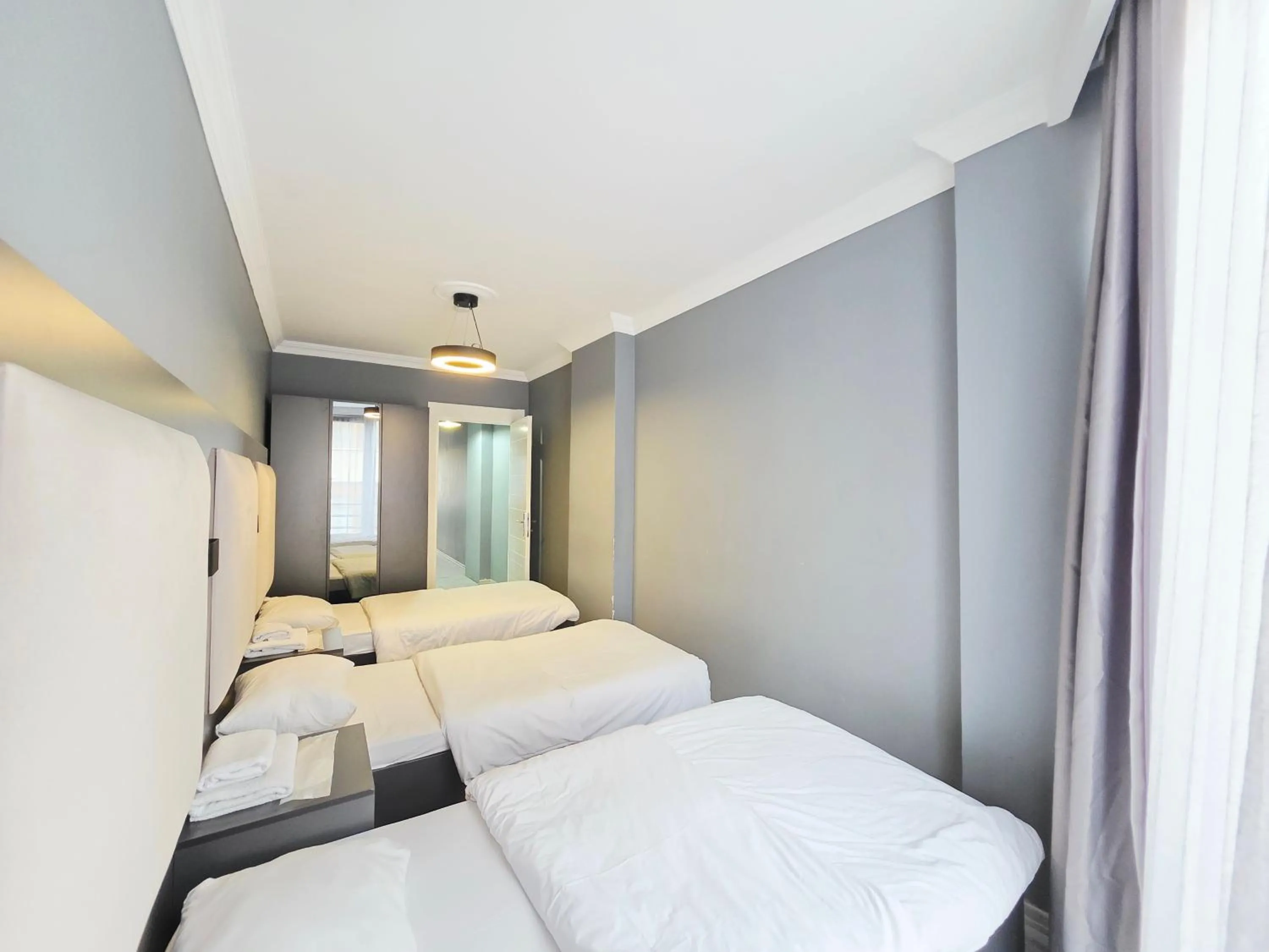 Bed in Birru Suites
