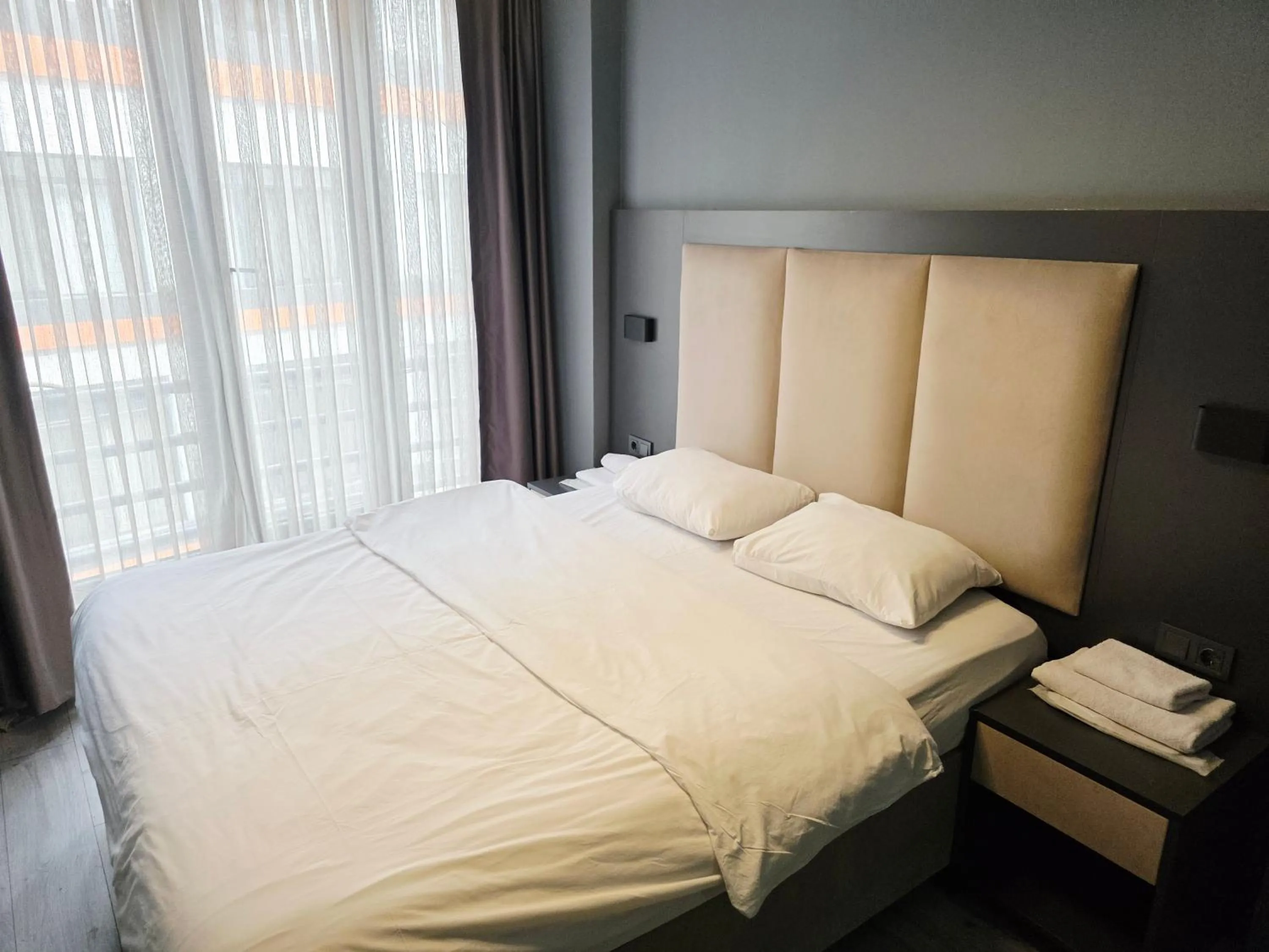 Bed in Birru Suites