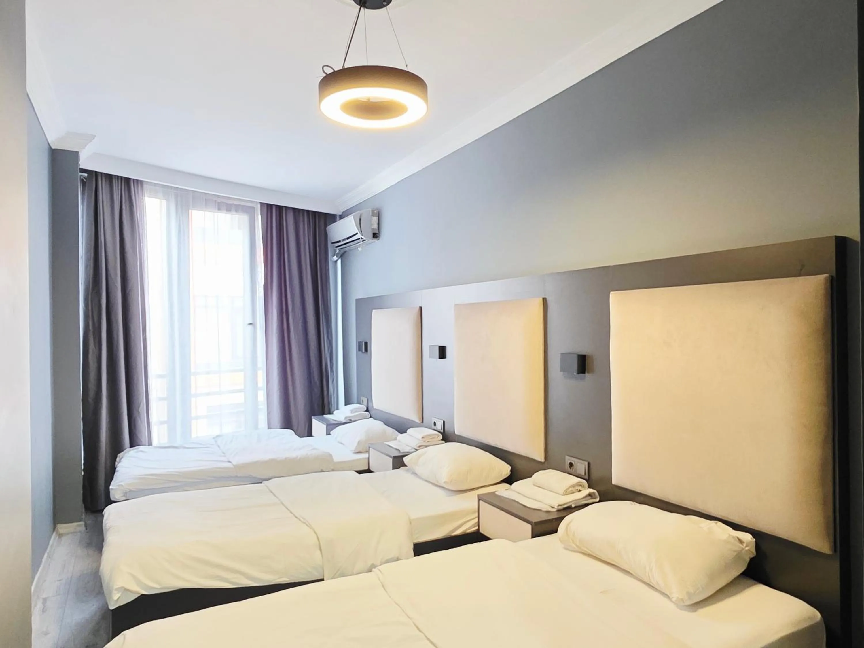 Bed in Birru Suites