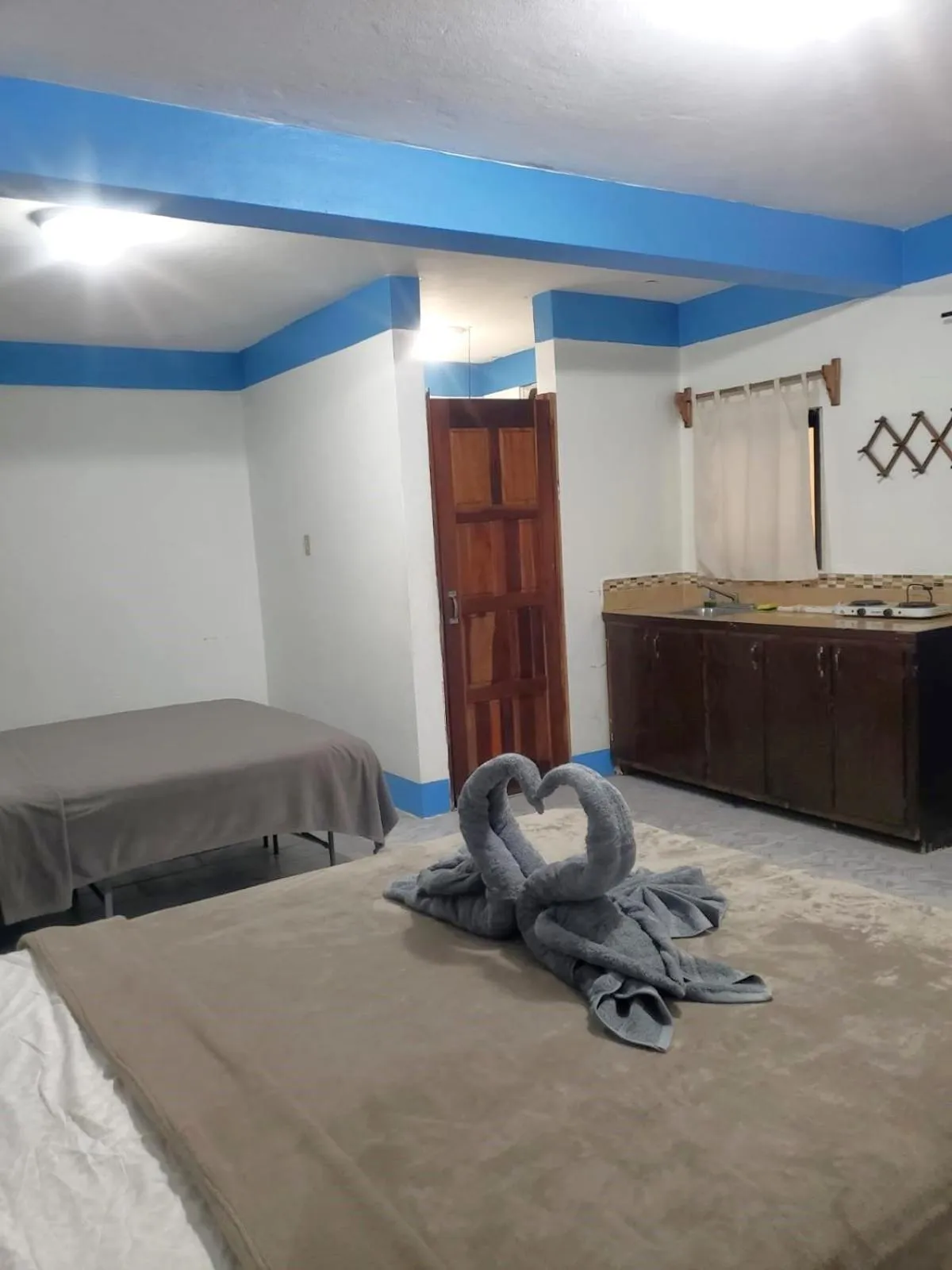 Bed in Beach Side Condos Caye Caulker by CCVH