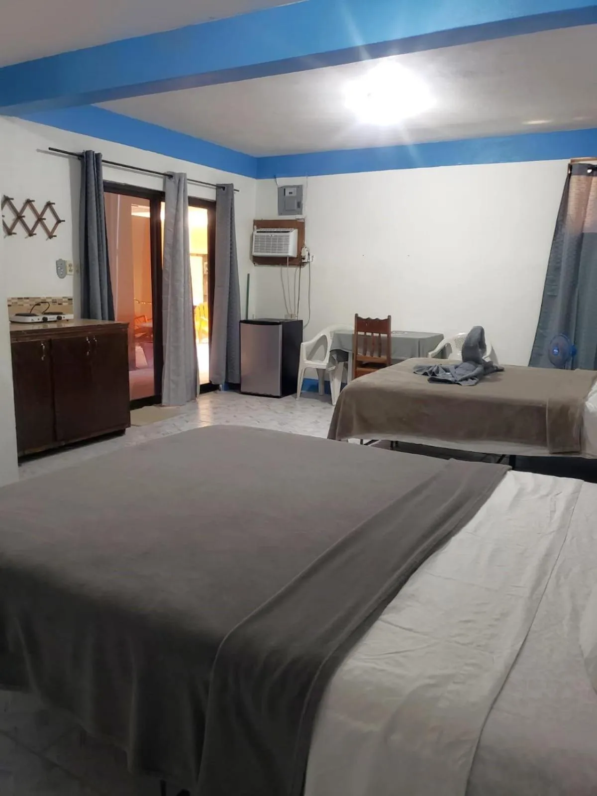Bed in Beach Side Condos Caye Caulker by CCVH