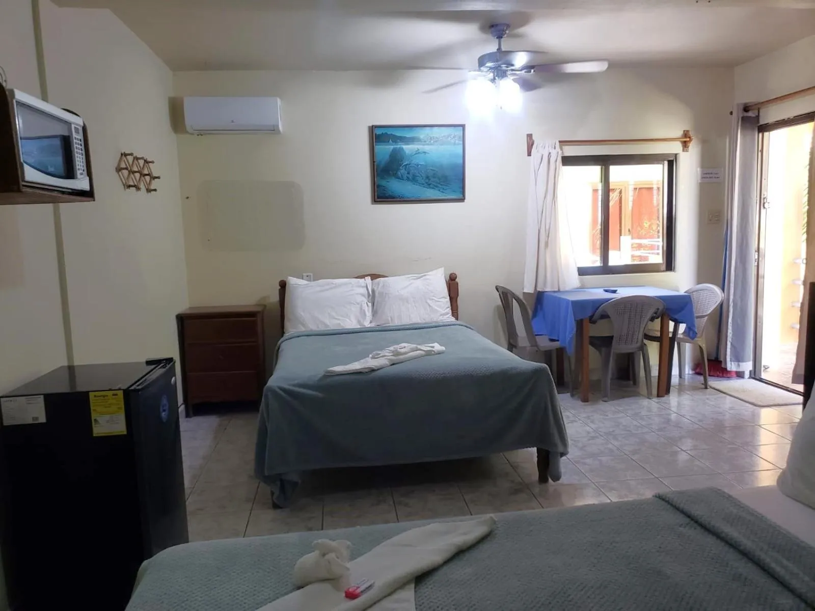 Bed in Beach Side Condos Caye Caulker by CCVH
