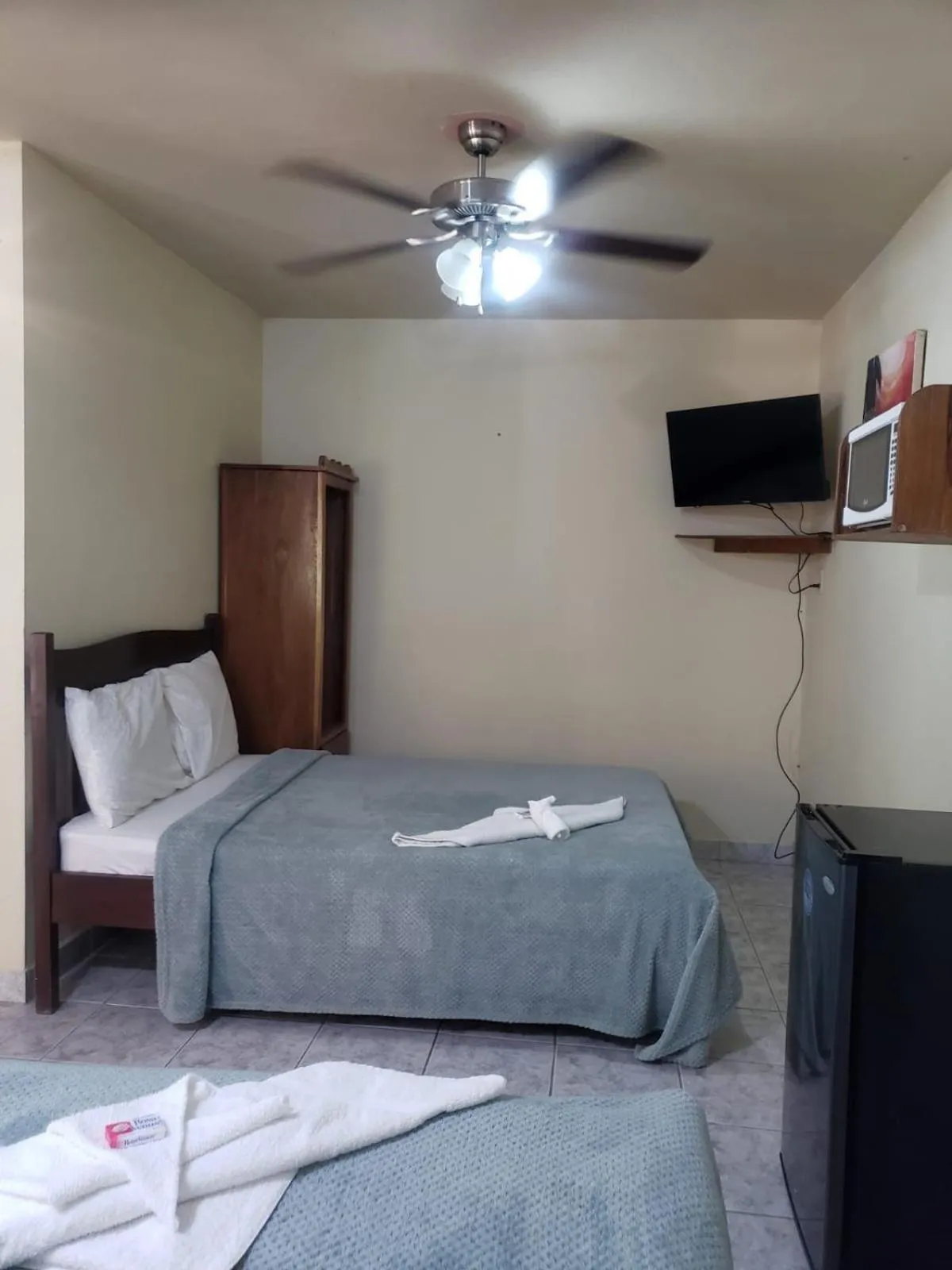 Bed in Beach Side Condos Caye Caulker by CCVH