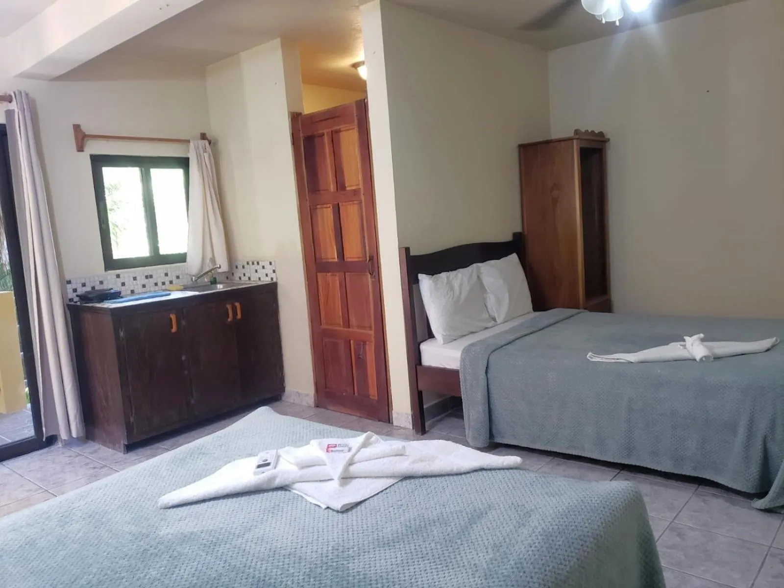 Bed in Beach Side Condos Caye Caulker by CCVH