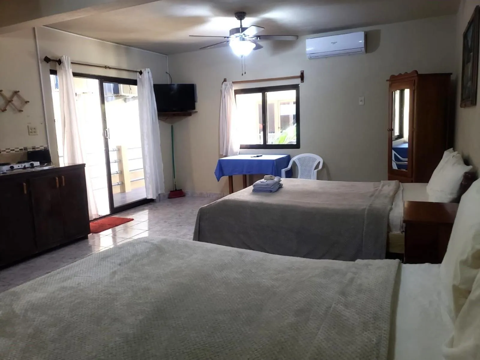 Bed in Beach Side Condos Caye Caulker by CCVH