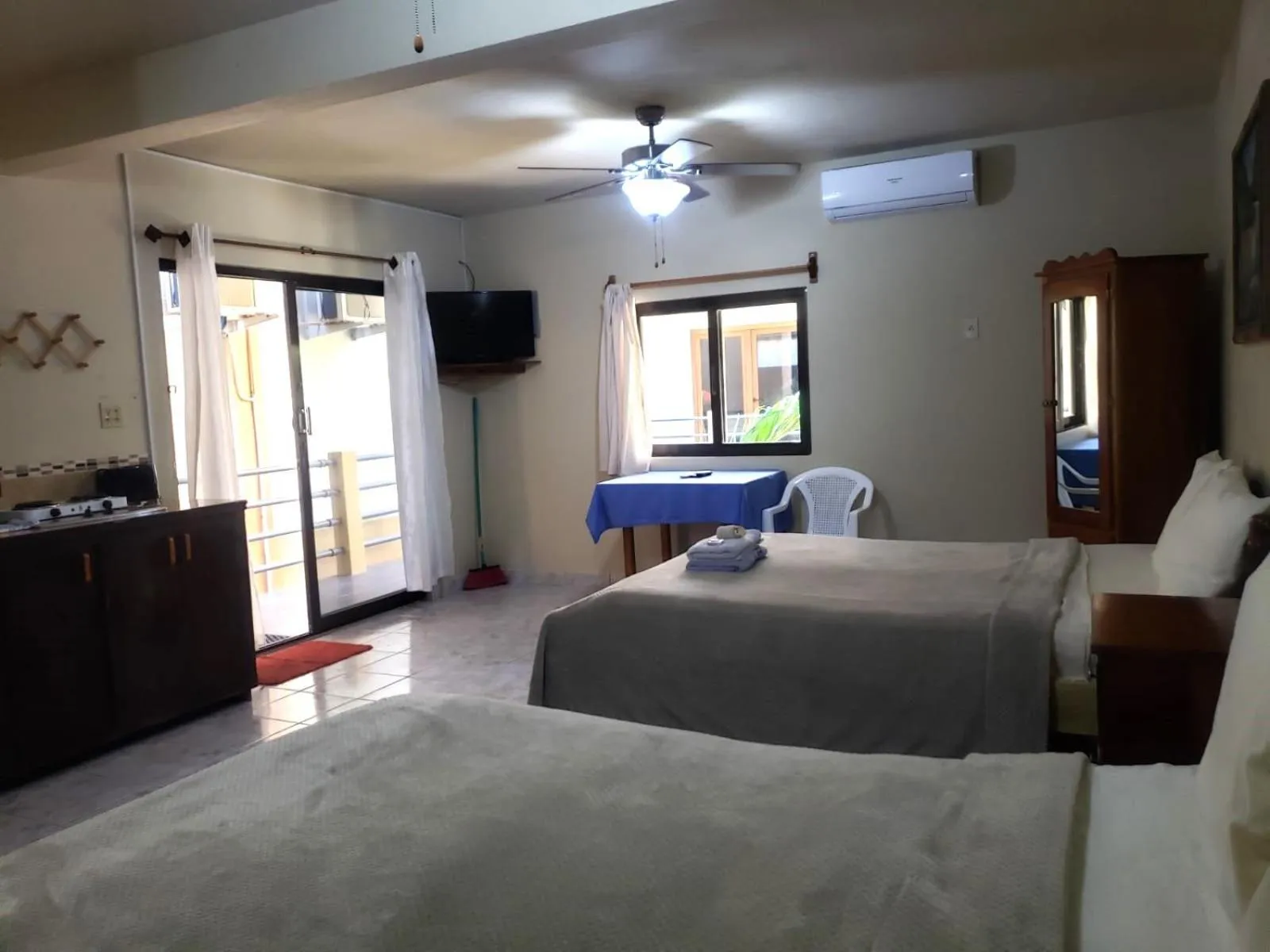 Bed in Beach Side Condos Caye Caulker by CCVH