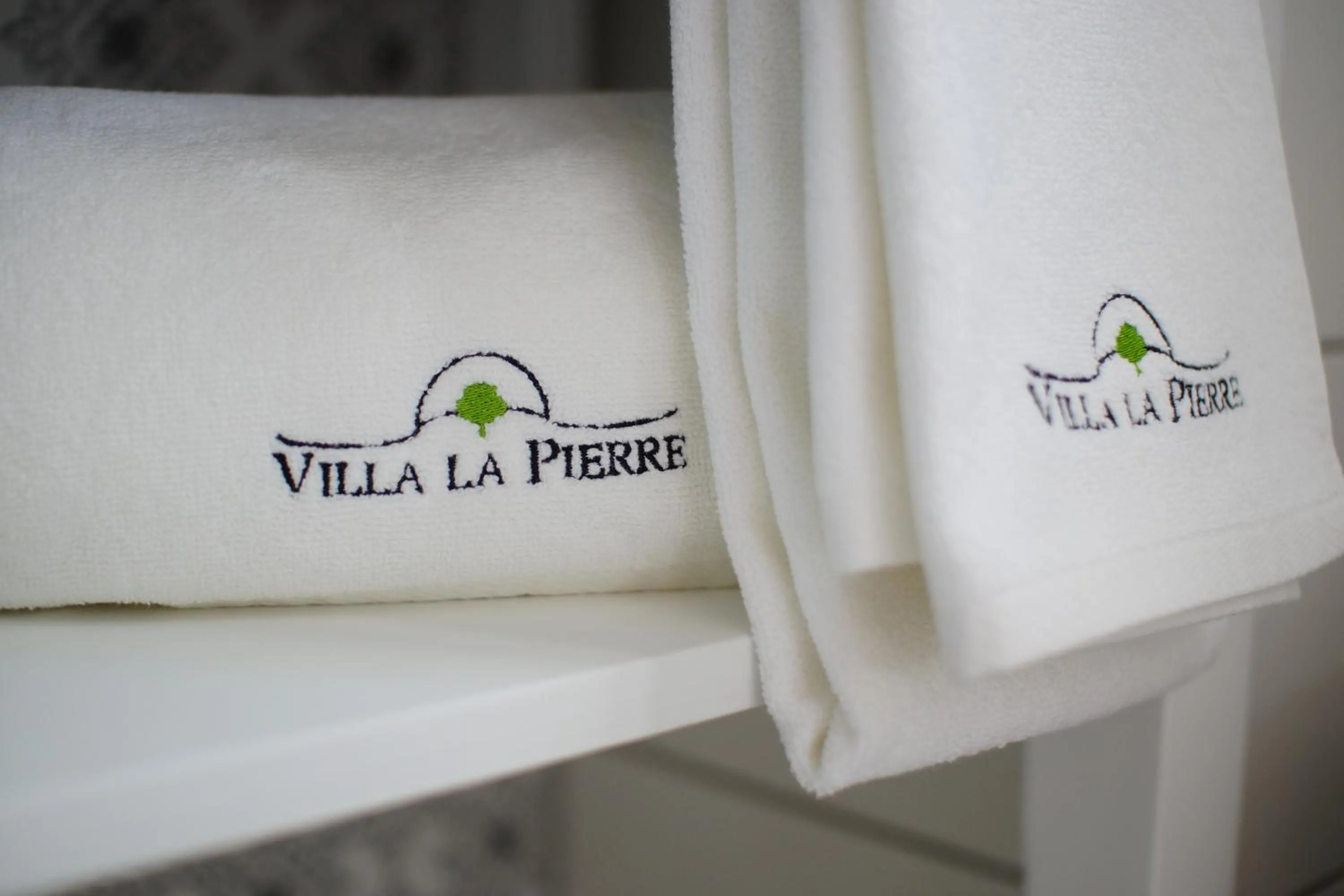 Property logo or sign in Villa La Pierre