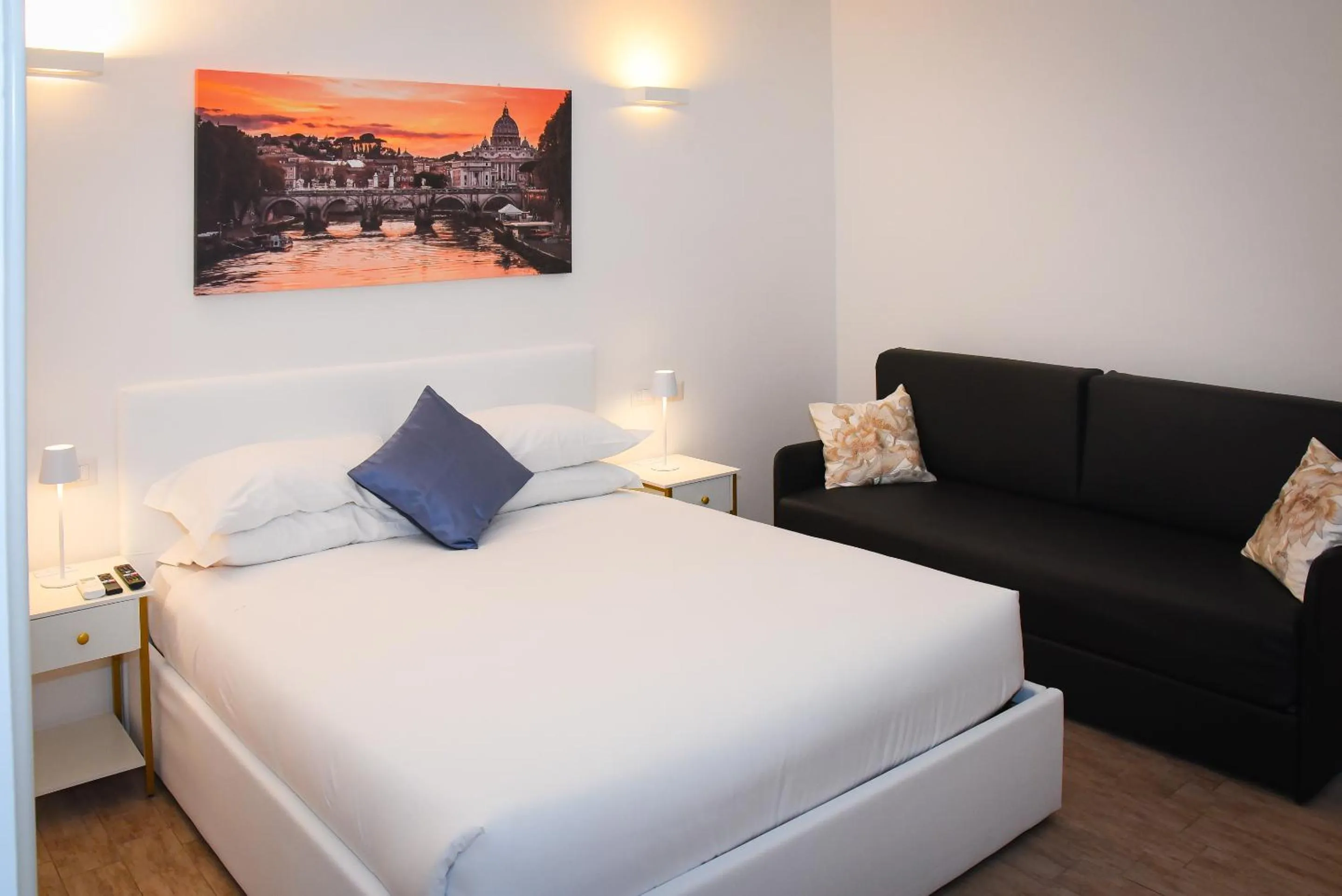 Bed in BQ House COLOSSEUM Luxury Rooms