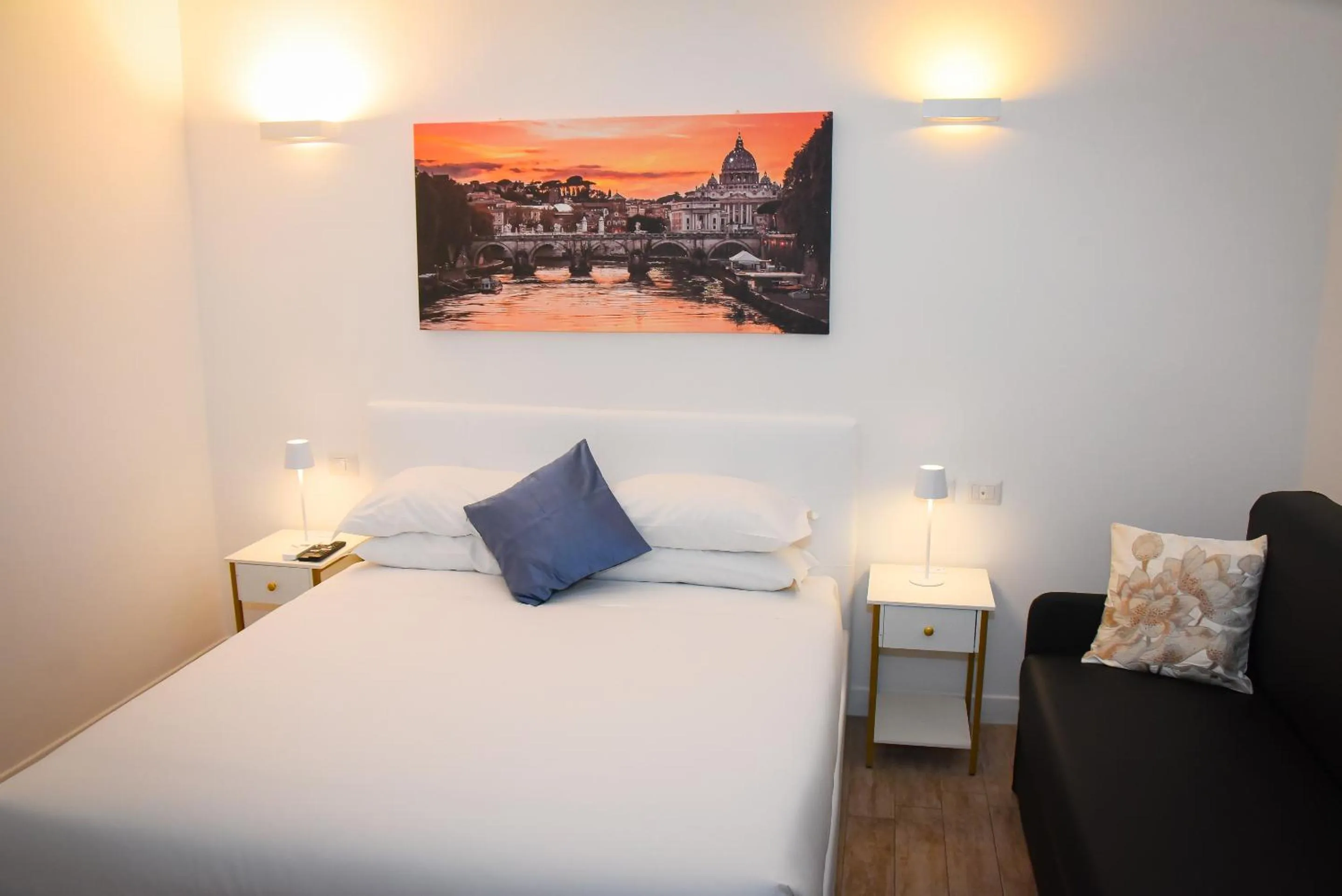 Bed in BQ House COLOSSEUM Luxury Rooms