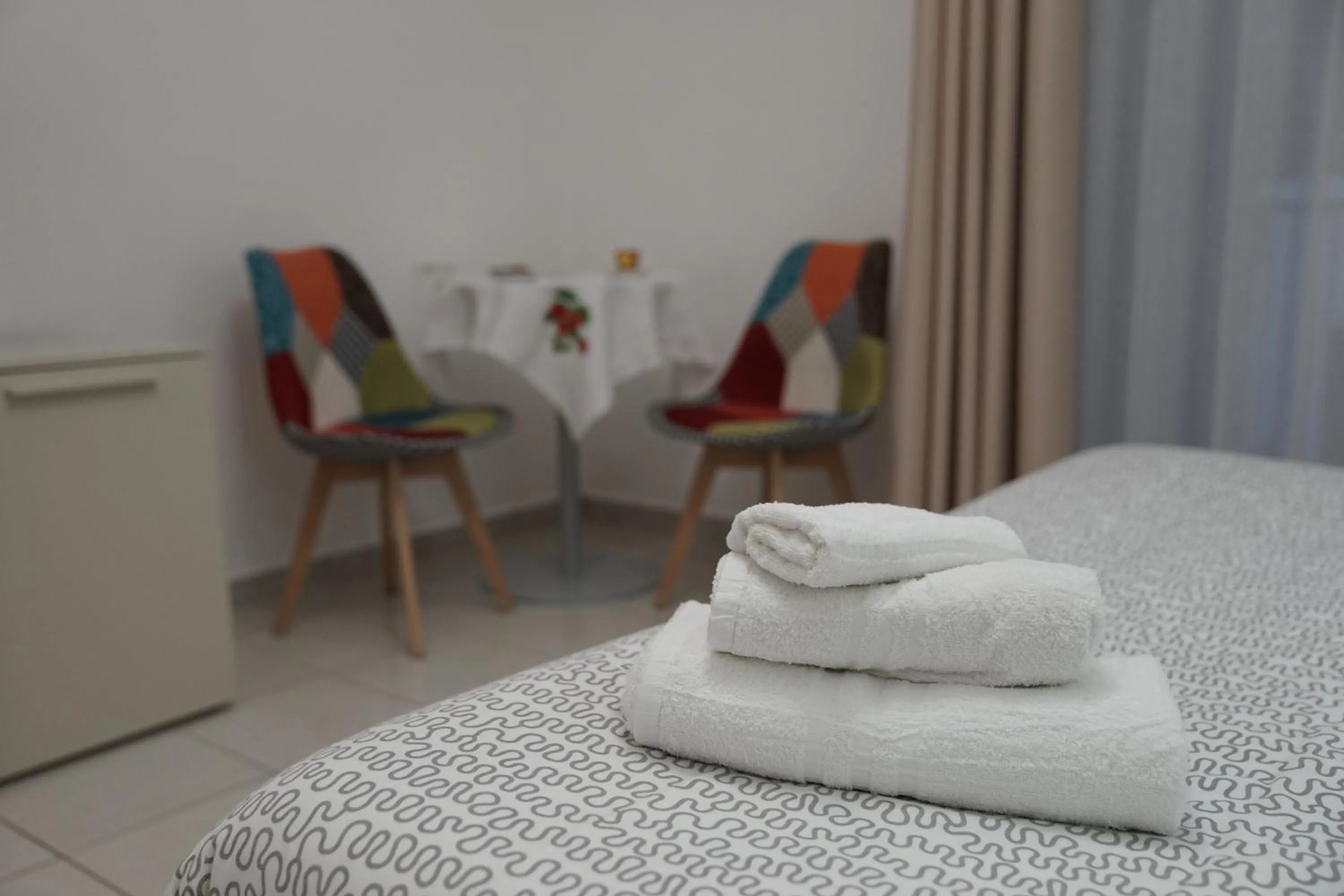 Seating area, Bed in B&B La Vie en Rose