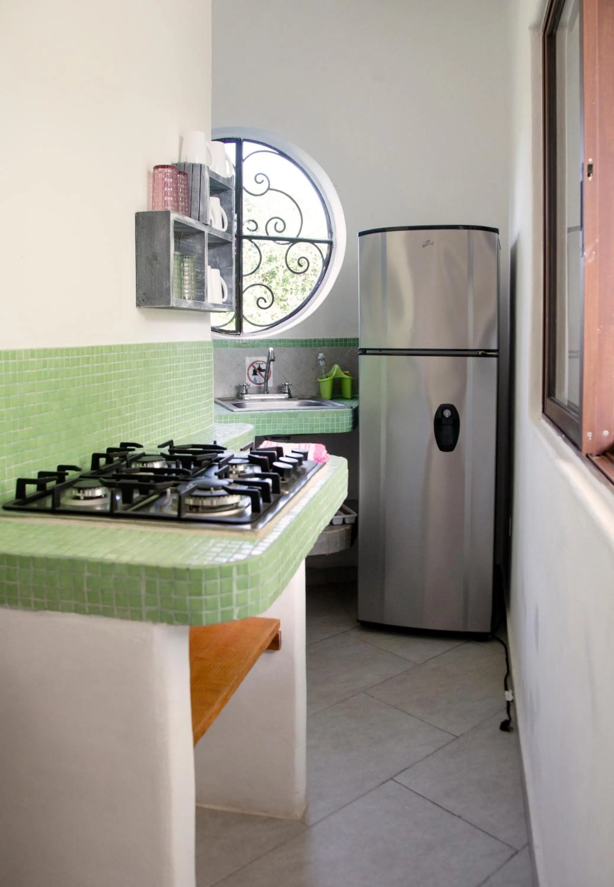 Kitchen or kitchenette in Sonido del mar Hotel Boutique & Yoga Loft