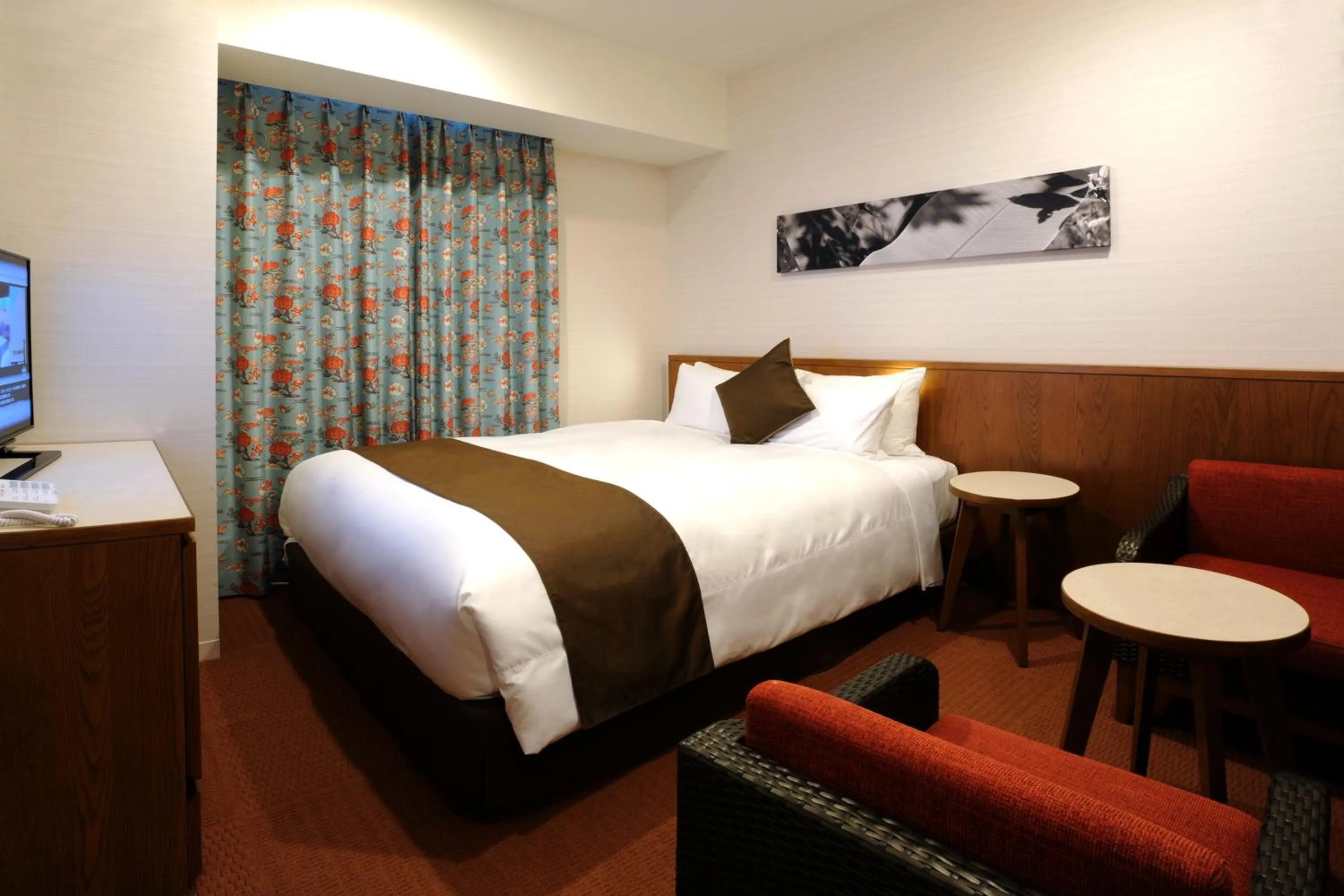Photo of the whole room, Bed in Hotel Gracery Naha