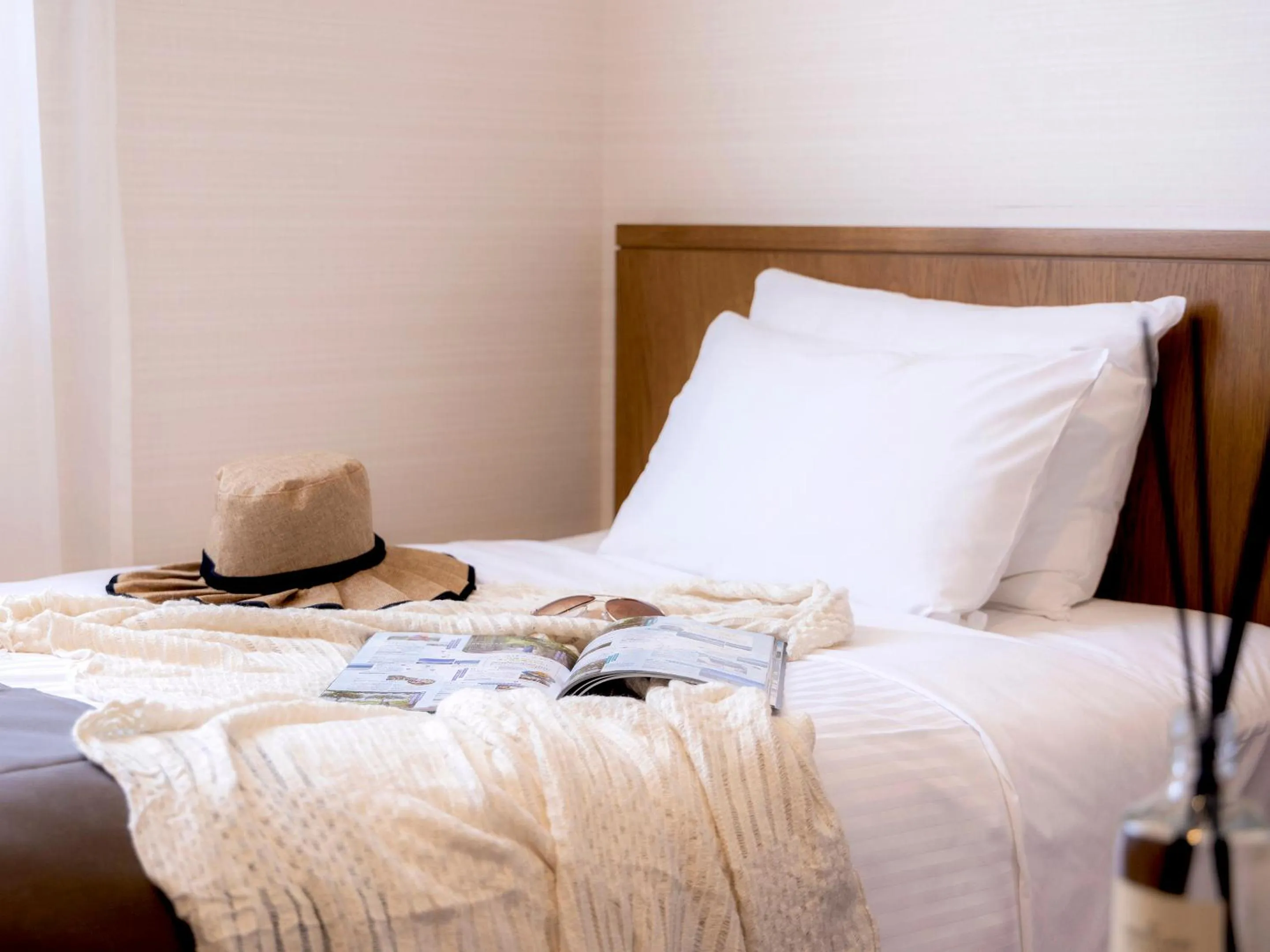 Bed in Hotel Gracery Naha