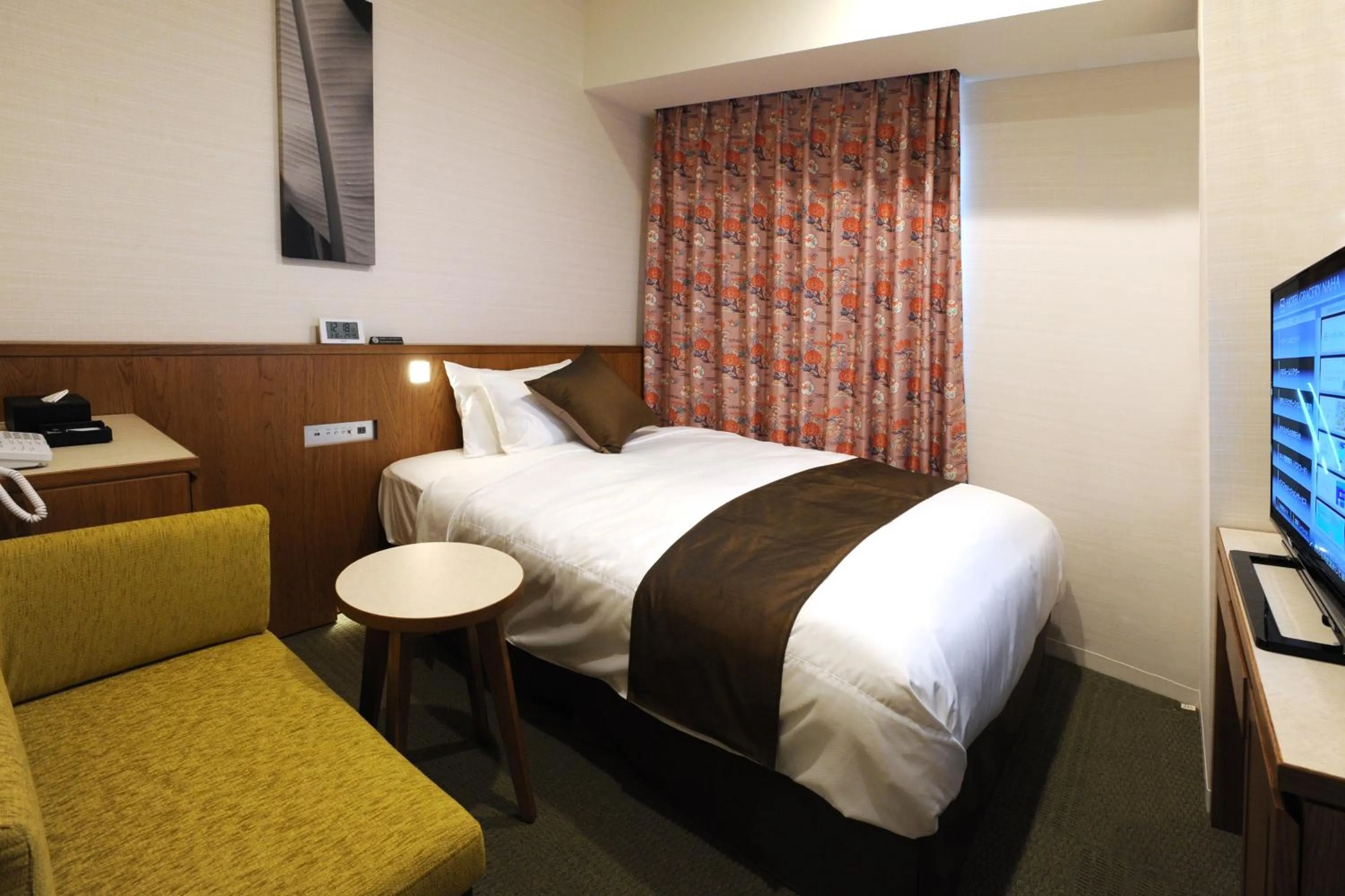 Photo of the whole room, Bed in Hotel Gracery Naha