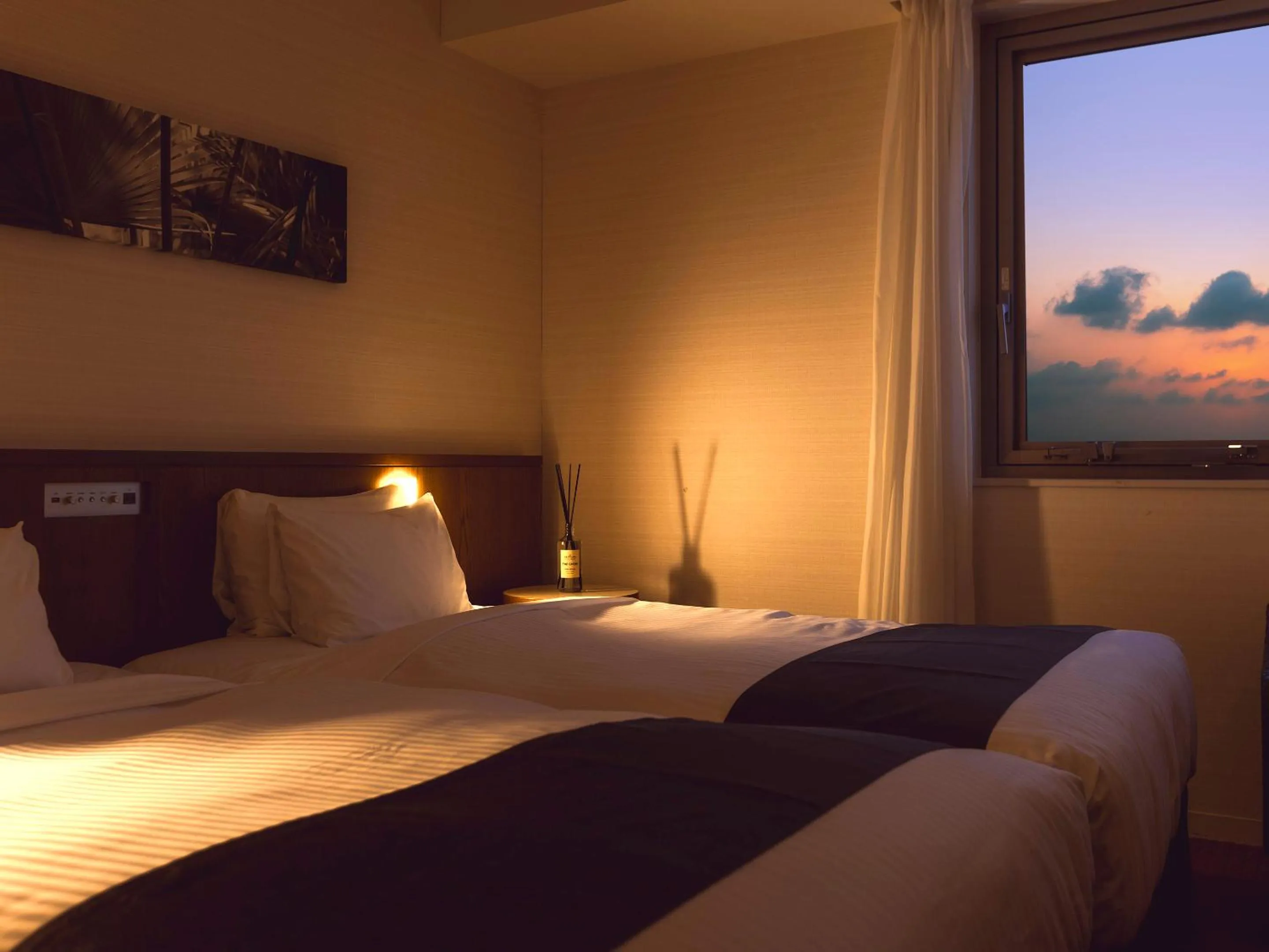 Bed in Hotel Gracery Naha